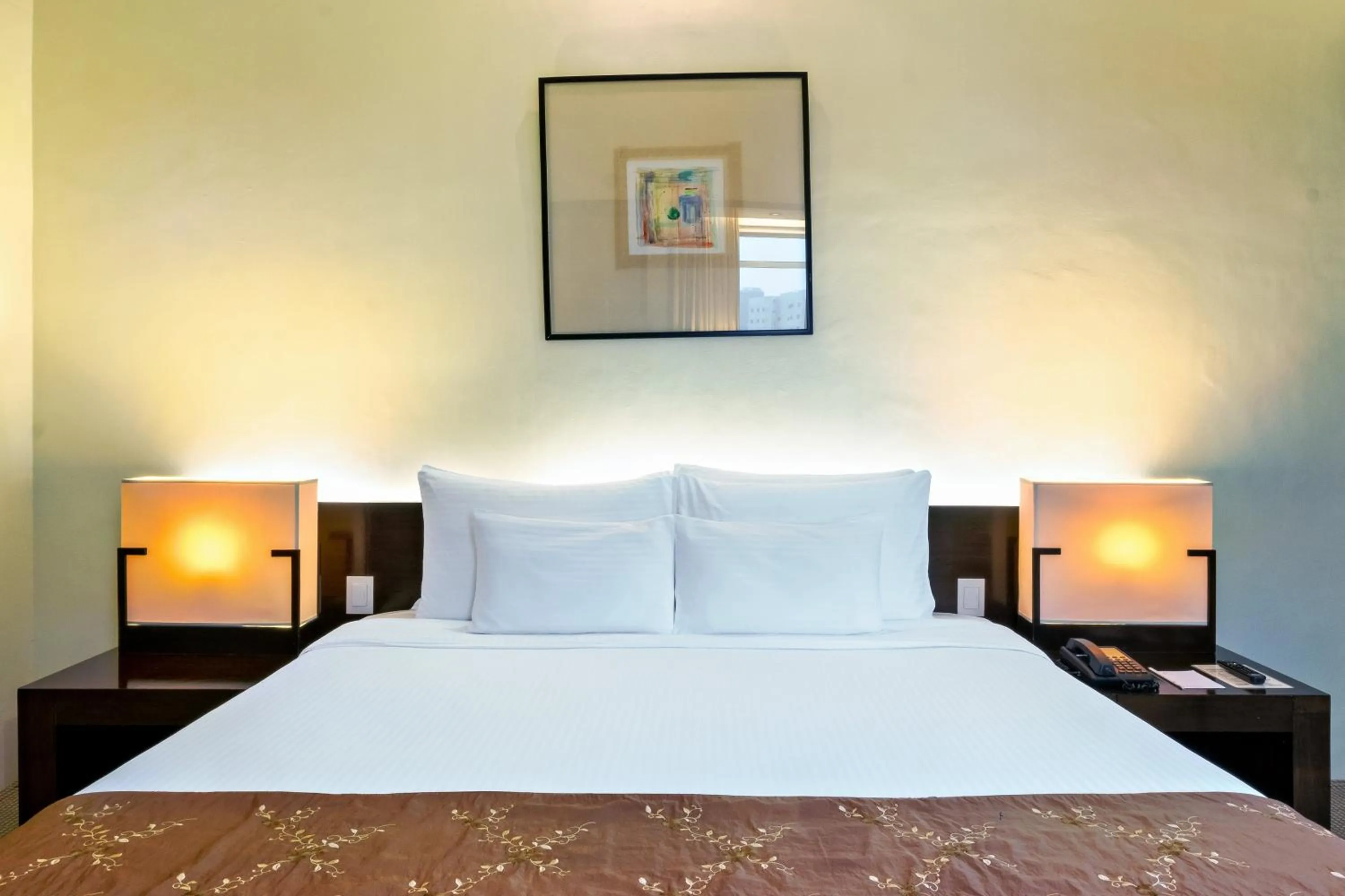 Bed in Waterfront Cebu City Hotel & Casino