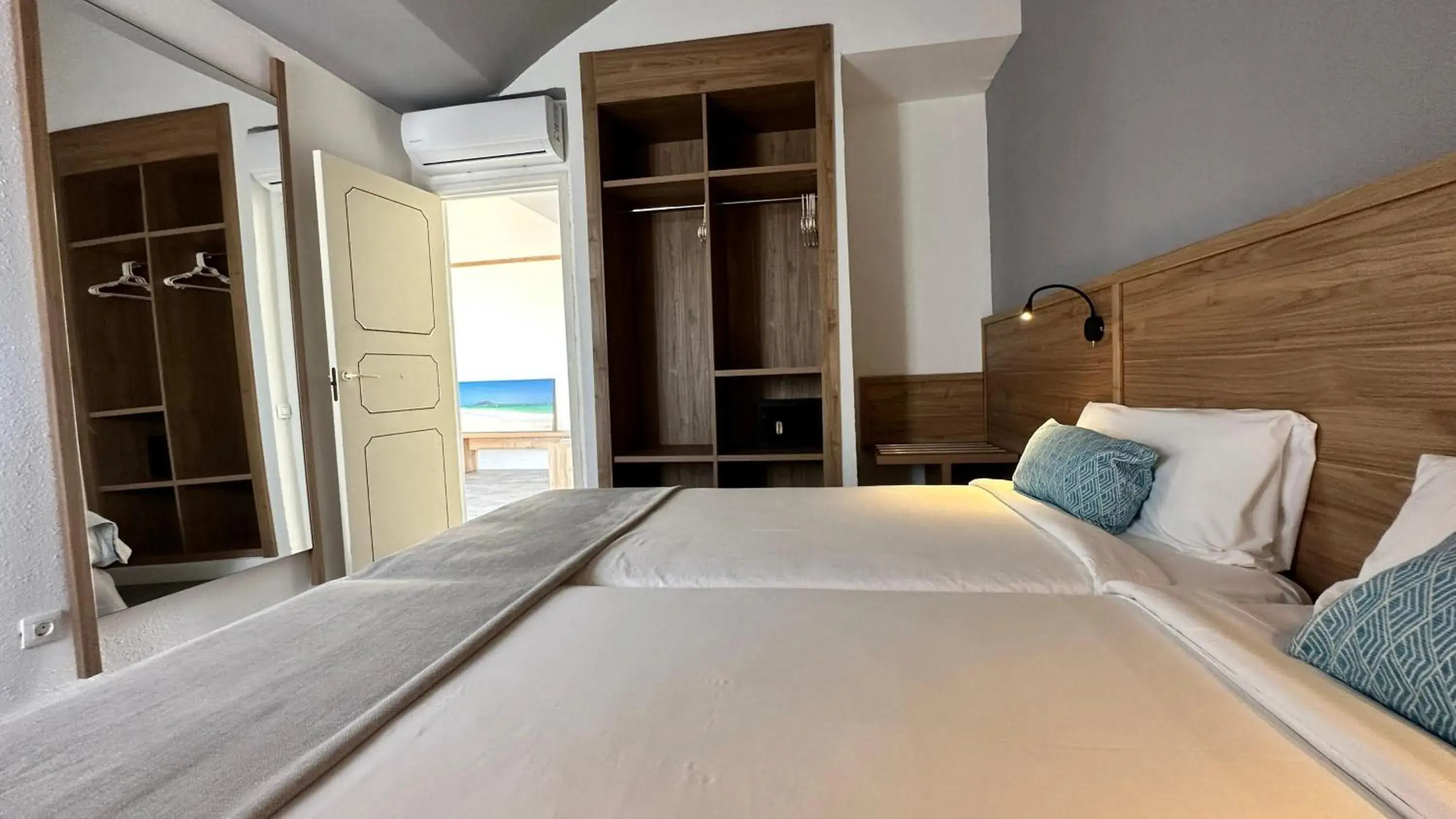 Photo of the whole room, Bed in BLUESEA Club Caleta Dorada Photo of the whole room, Bed in BLUESEA Club Caleta Dorada