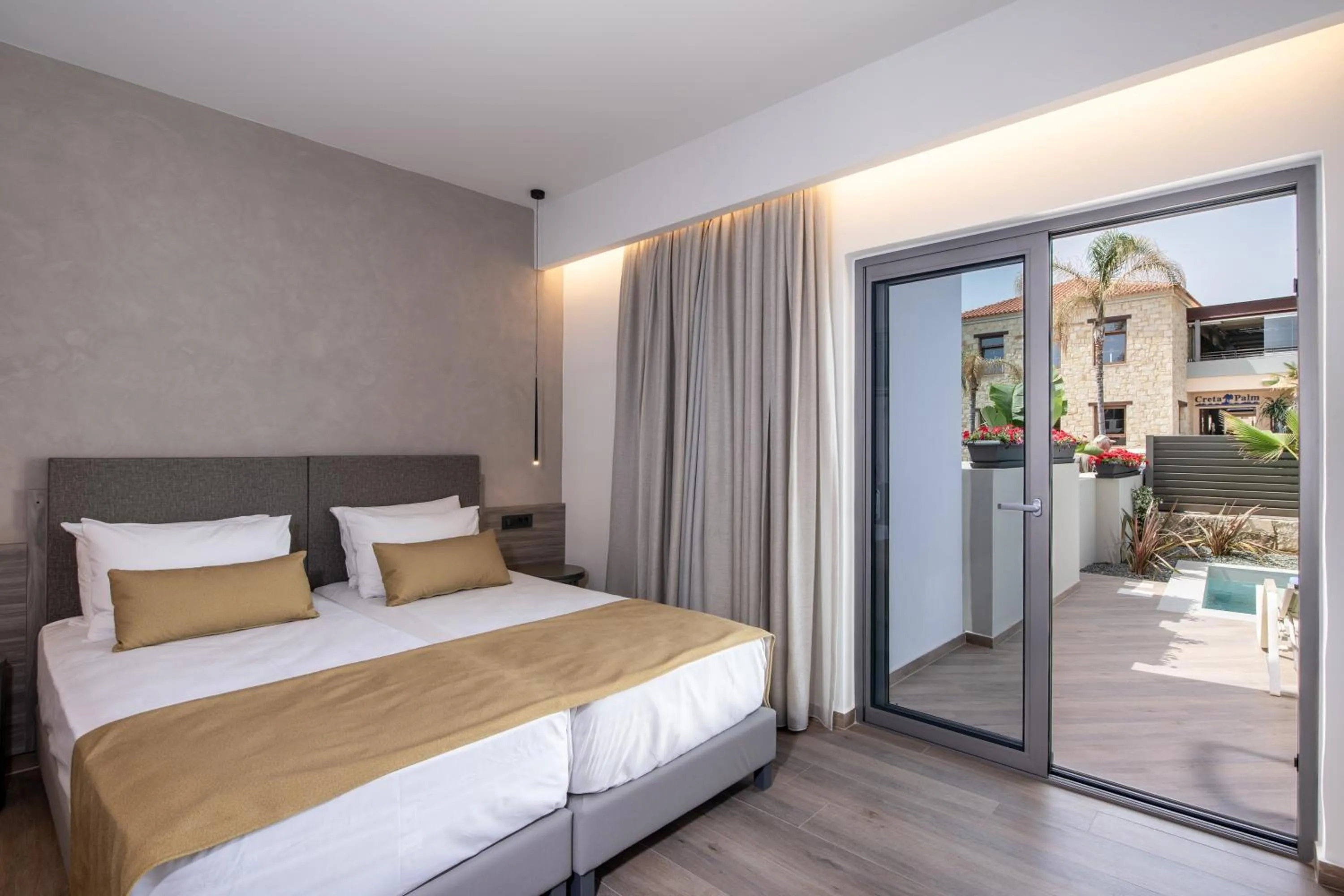 Bed in Creta Palm Resort Hotel & Apartments