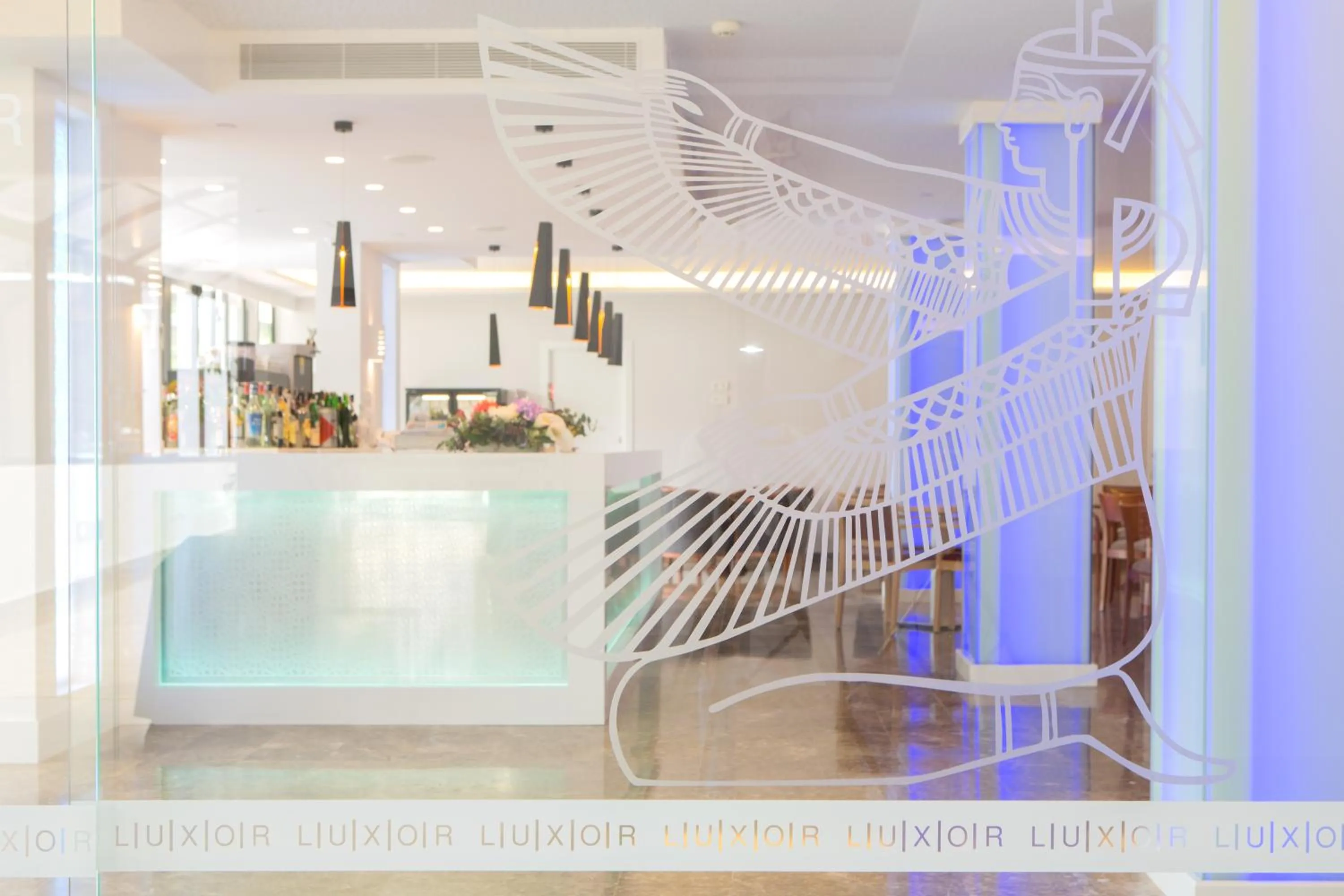 Property logo or sign in Hotel Luxor