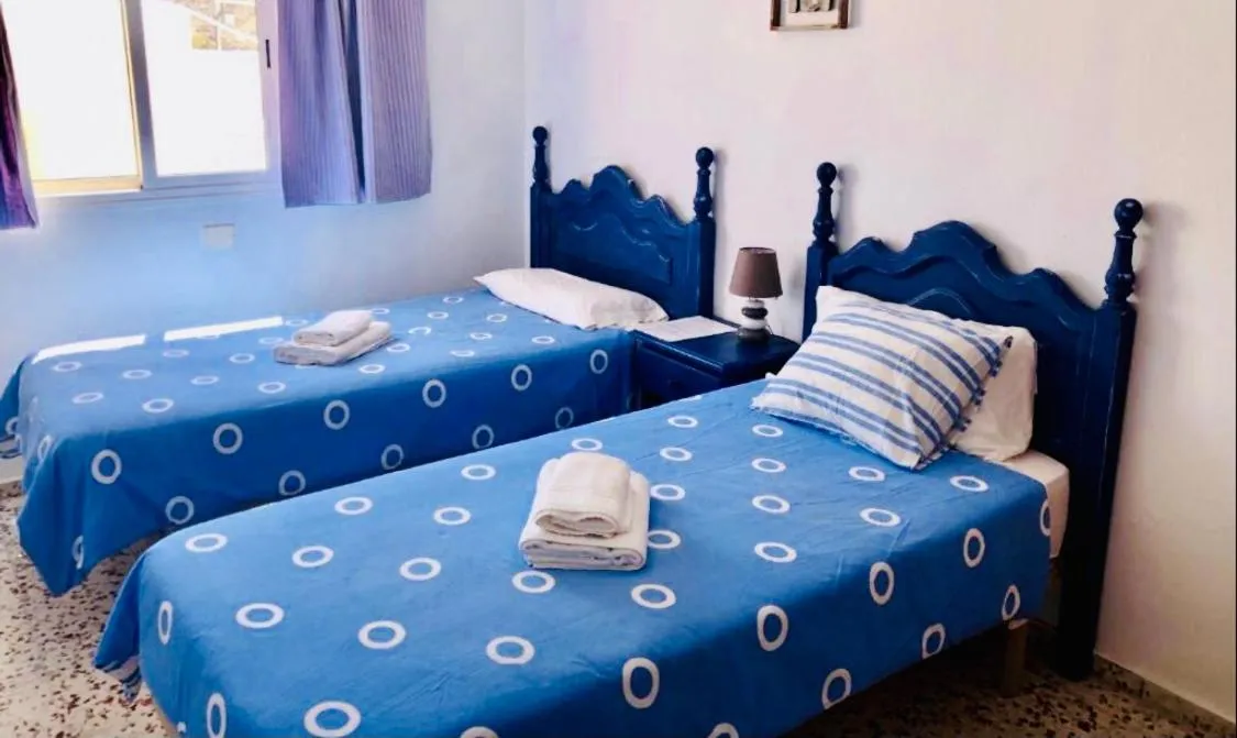 Bed in Pensión Playa