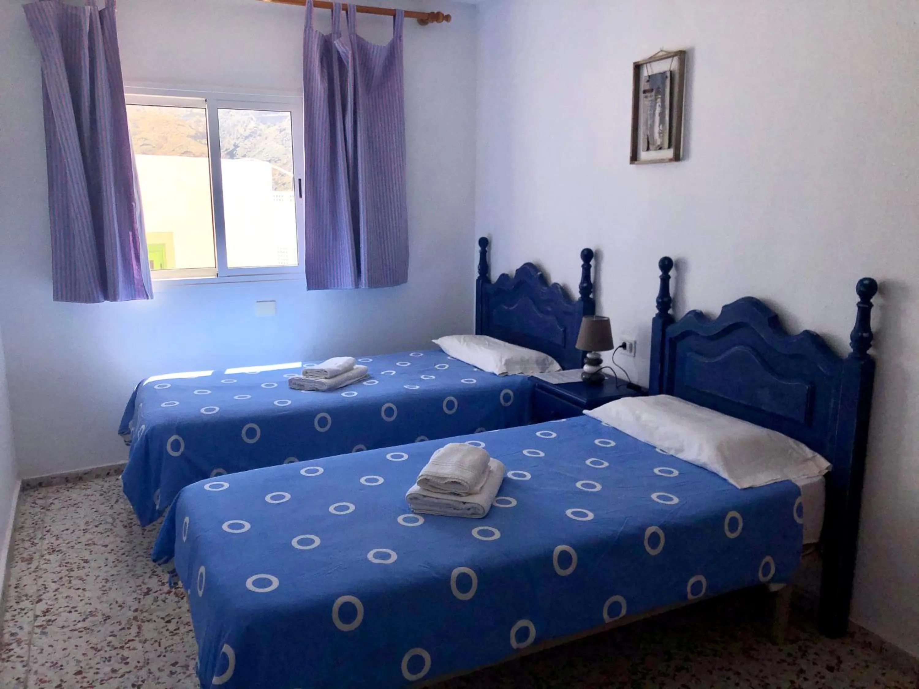 Bed in Pensión Playa