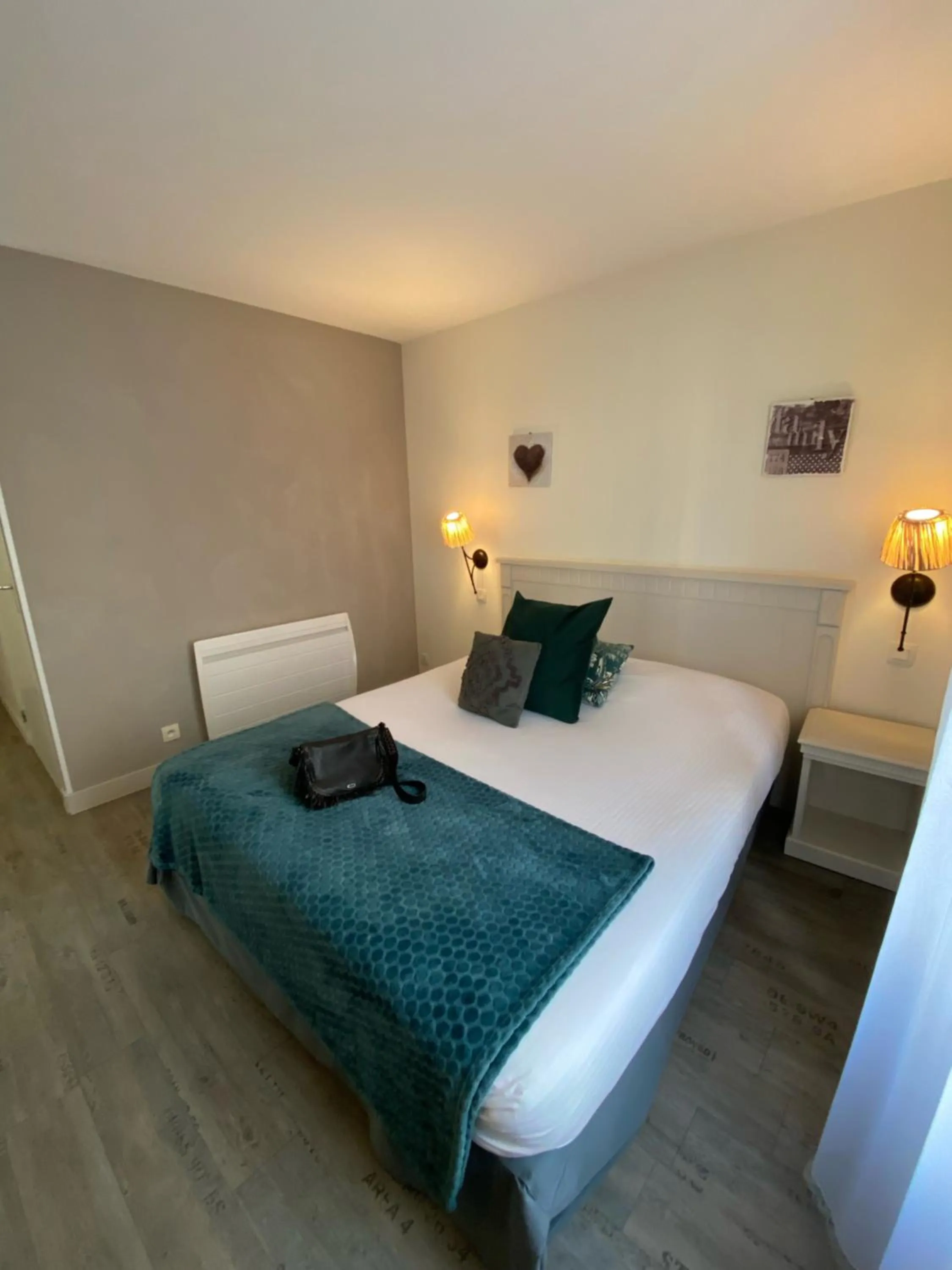 Bed in La glycine hotel, spa et bien-être