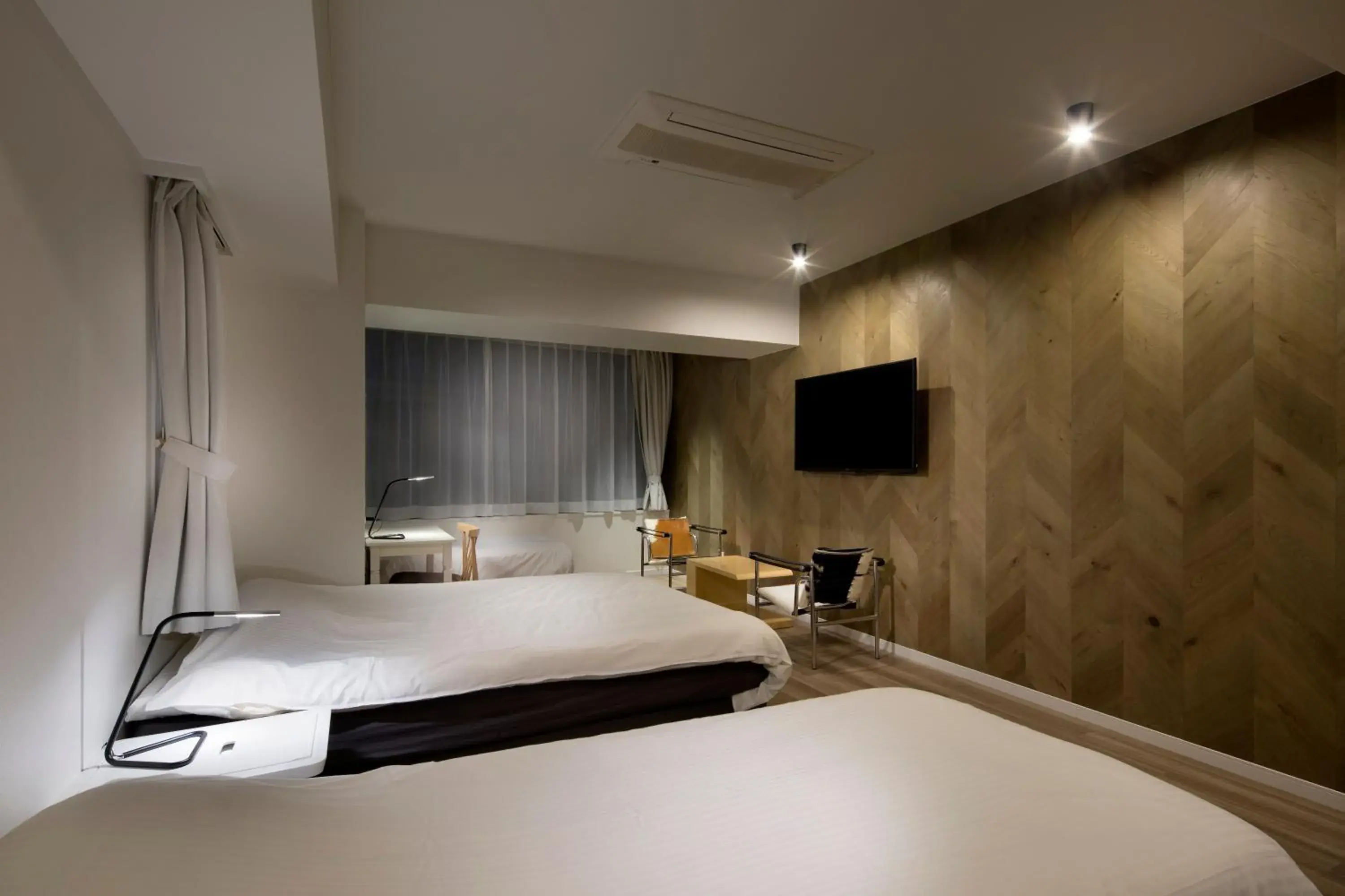 Bed in Shinjuku City Hotel N.U.T.S Tokyo Bed in Shinjuku City Hotel N.U.T.S Tokyo