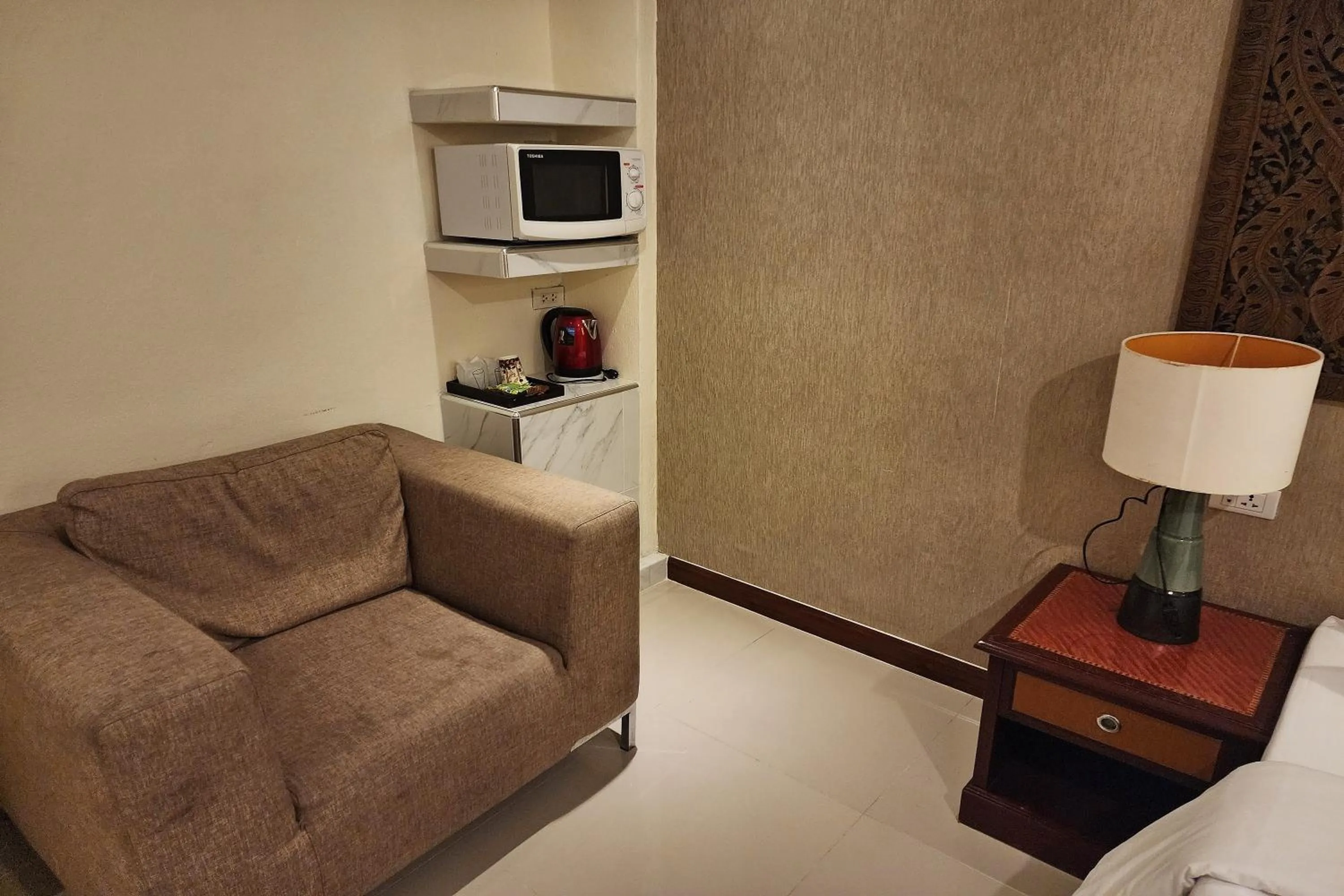 Bedroom in Kim Hotel At Bangplong