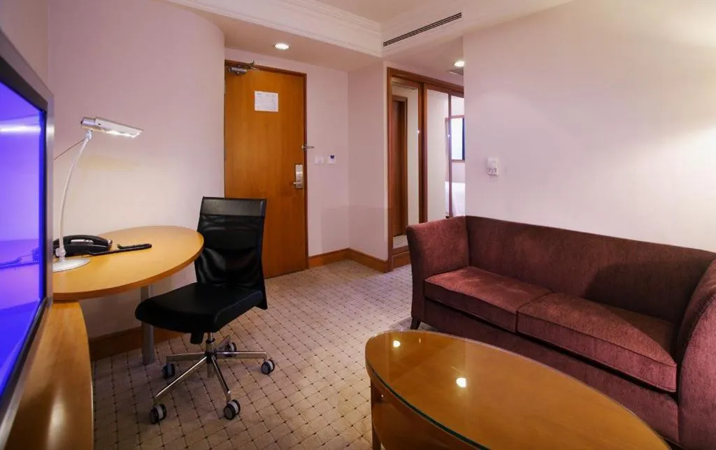 Living room in HiONE Holiday Hotel