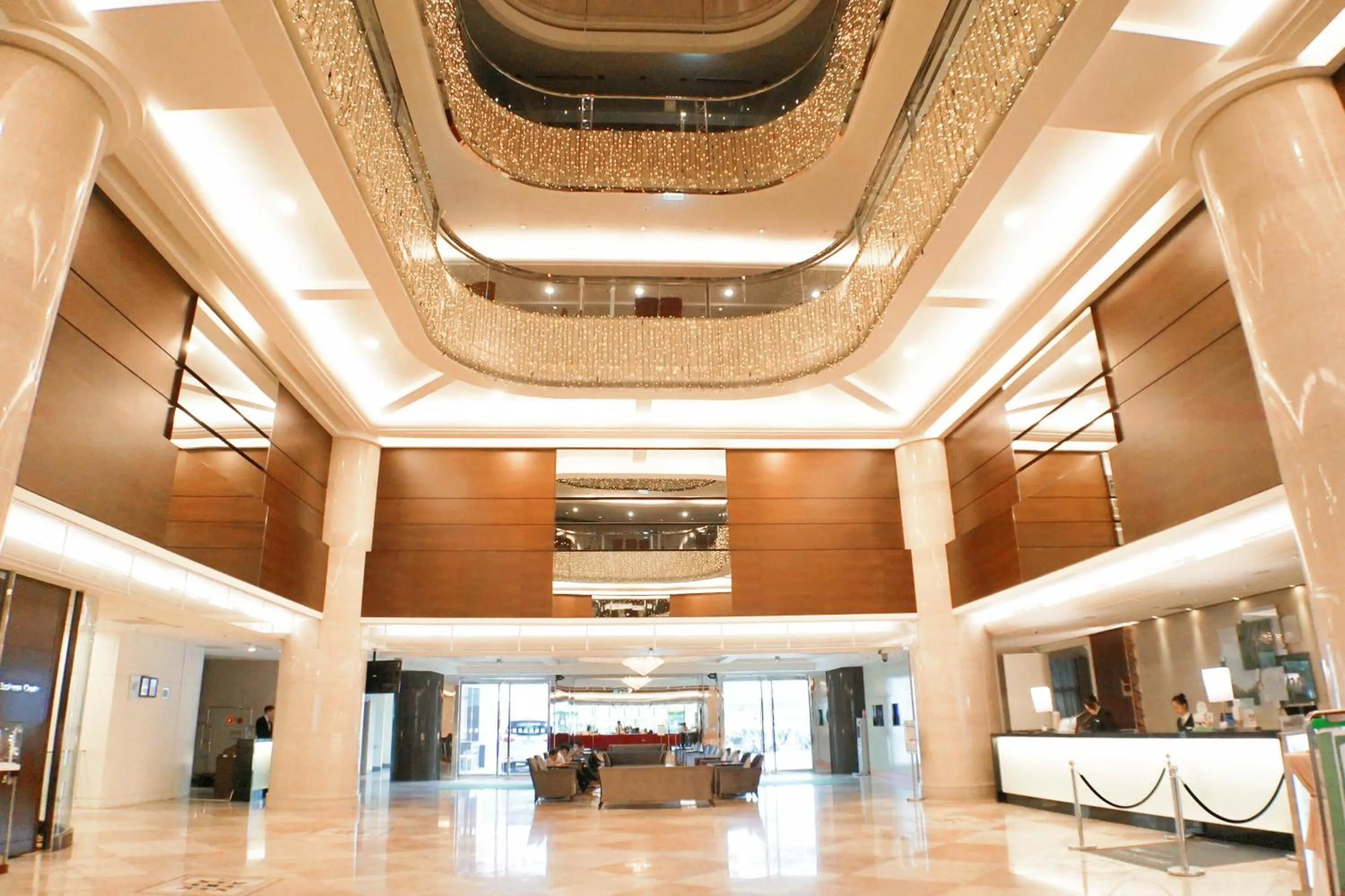 Lobby or reception in HiONE Holiday Hotel