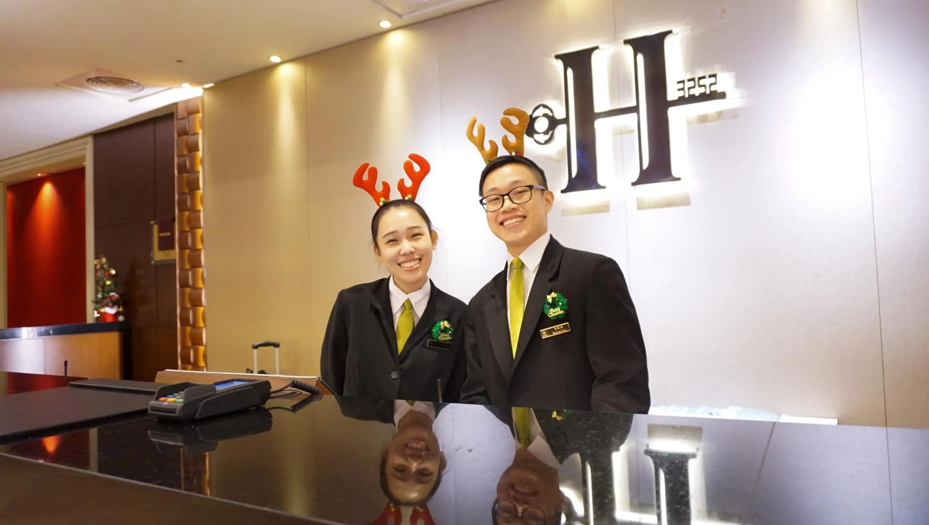 Staff in HiONE Holiday Hotel