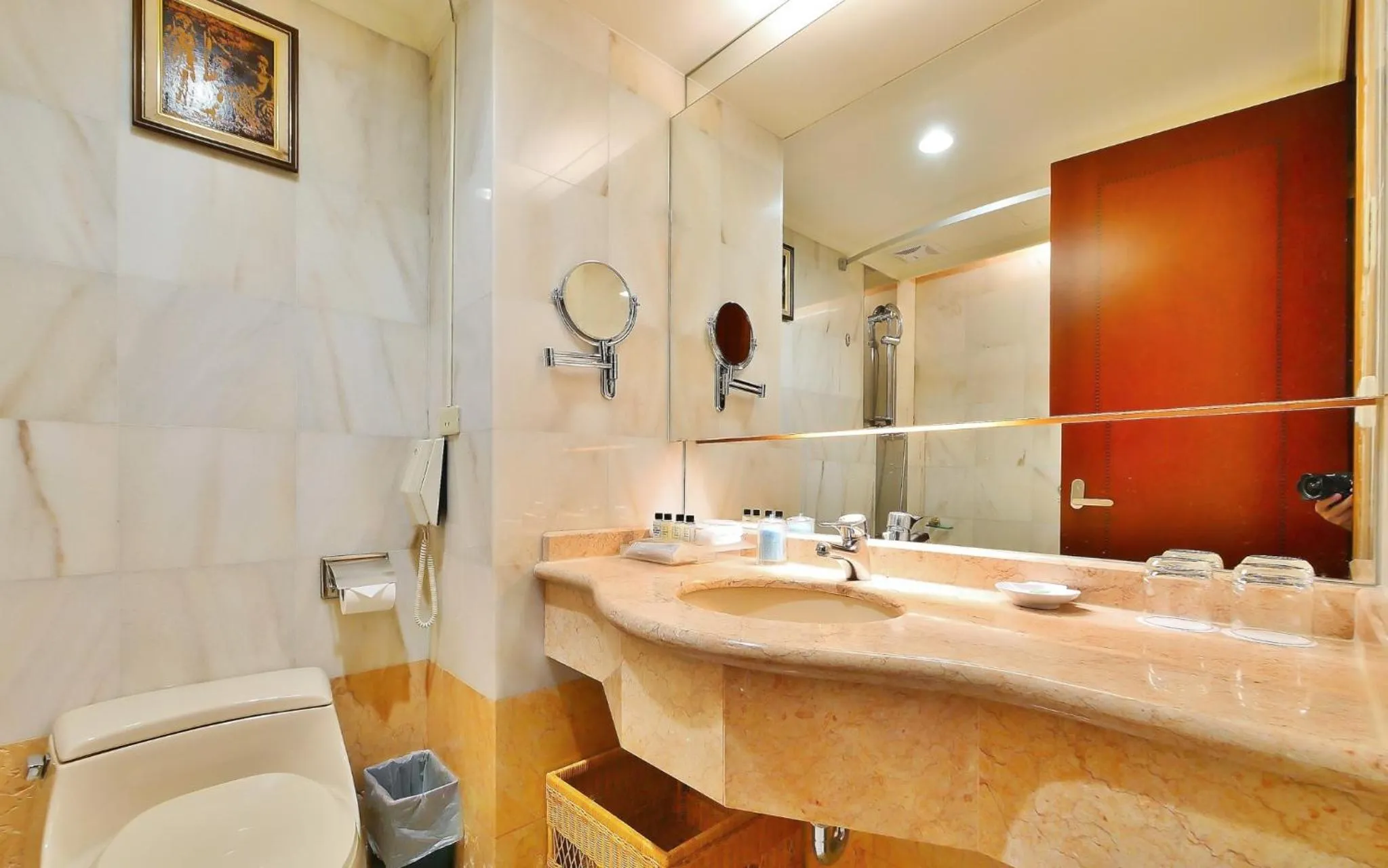 Bathroom in HiONE Holiday Hotel