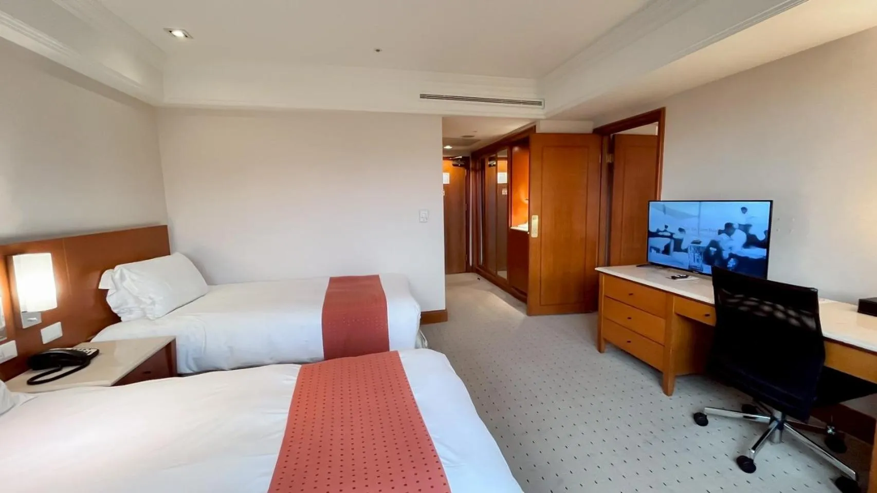 Bed in HiONE Holiday Hotel