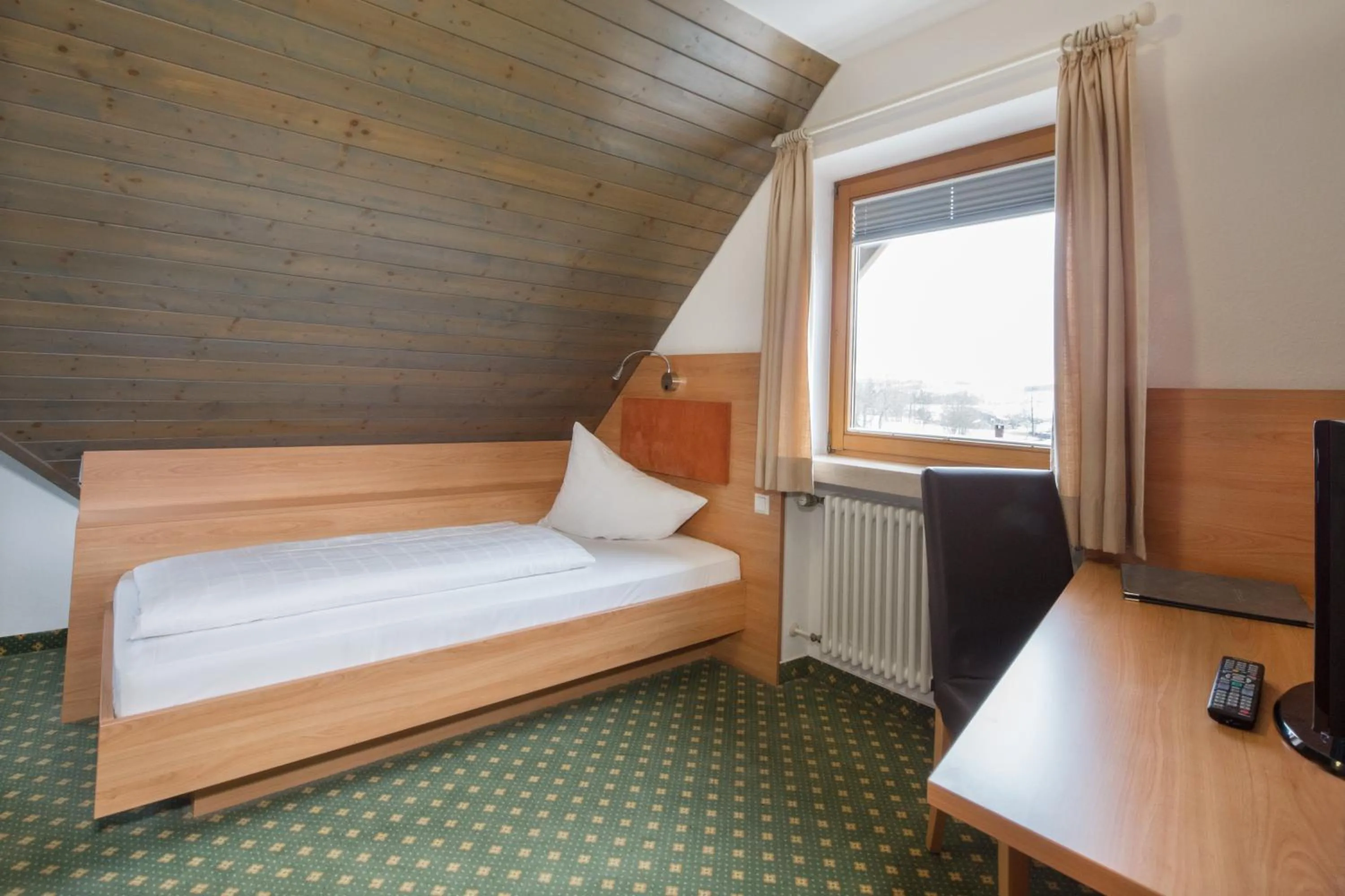 Bed in Hotel Restaurant JÄGERHAUS
