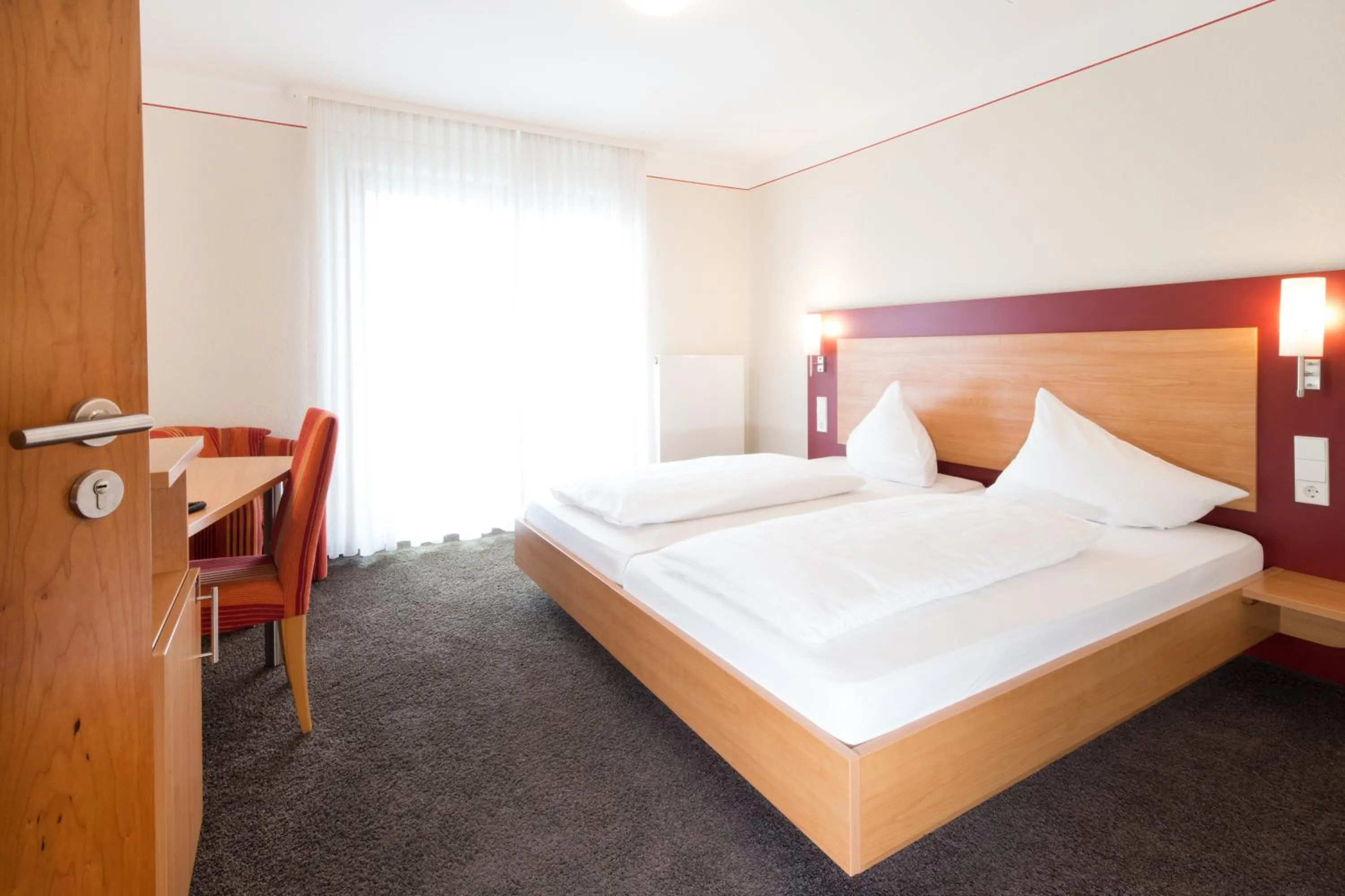 Bed in Hotel Restaurant JÄGERHAUS
