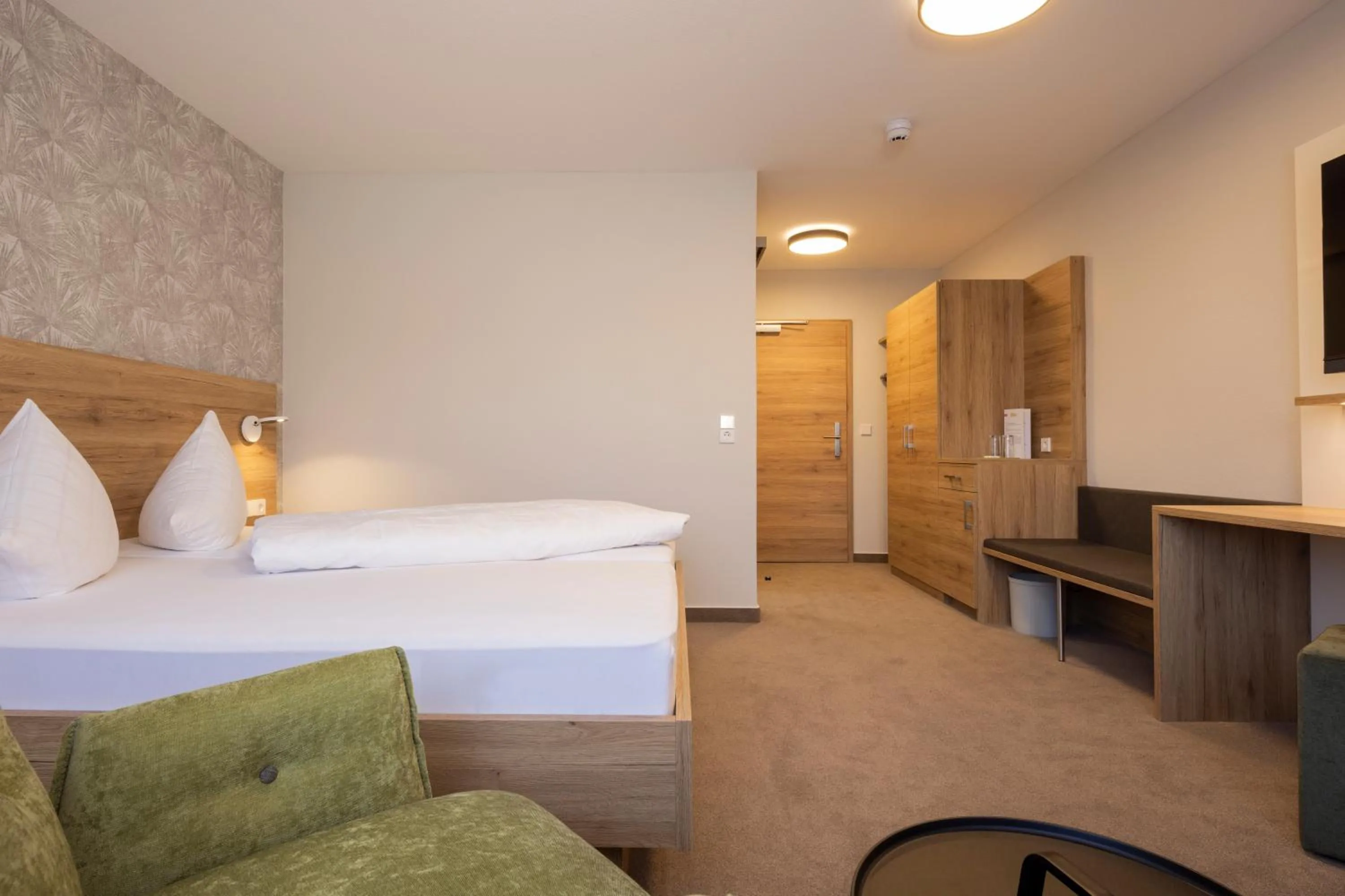 Bed in Hotel Restaurant JÄGERHAUS