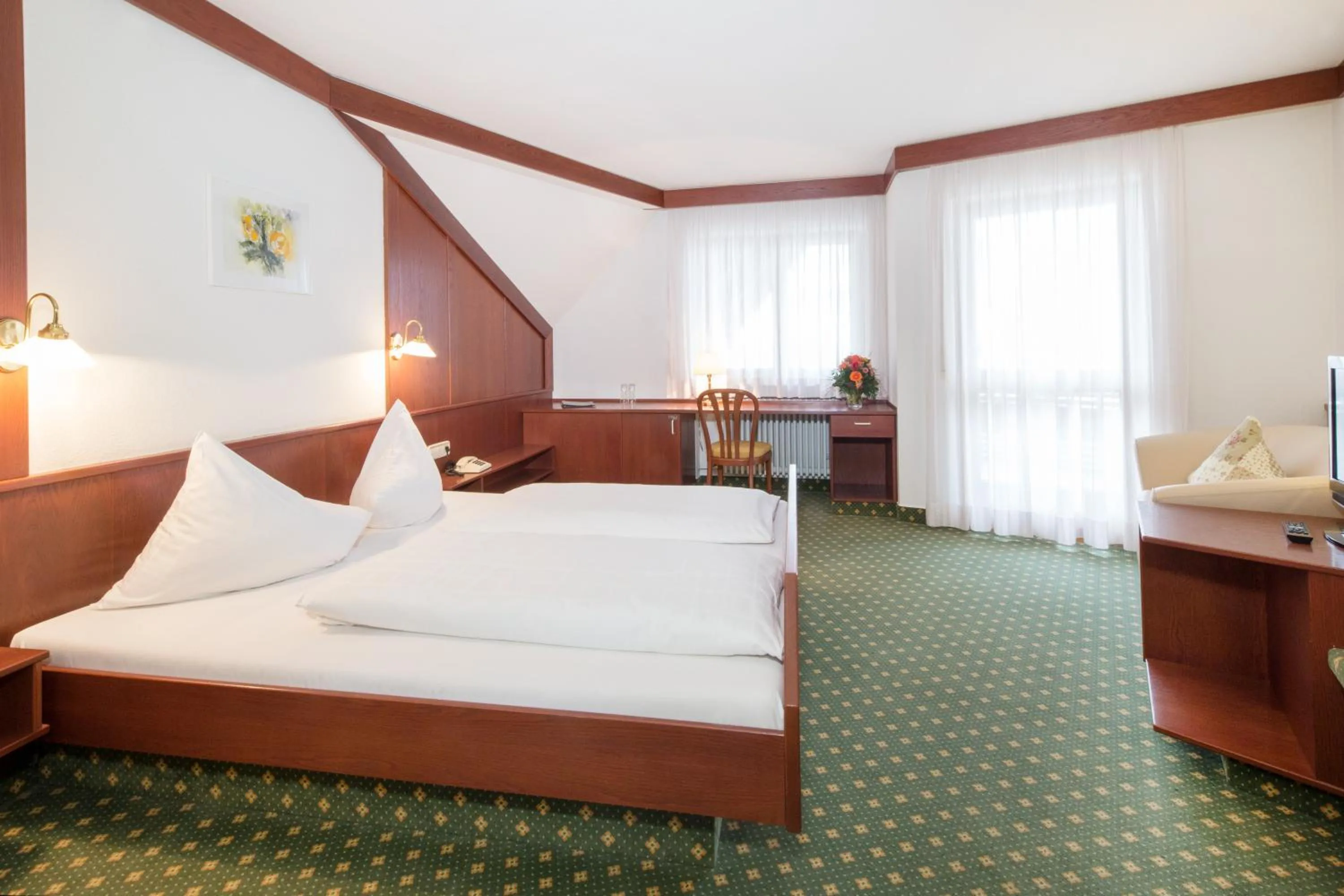 Bed in Hotel Restaurant JÄGERHAUS