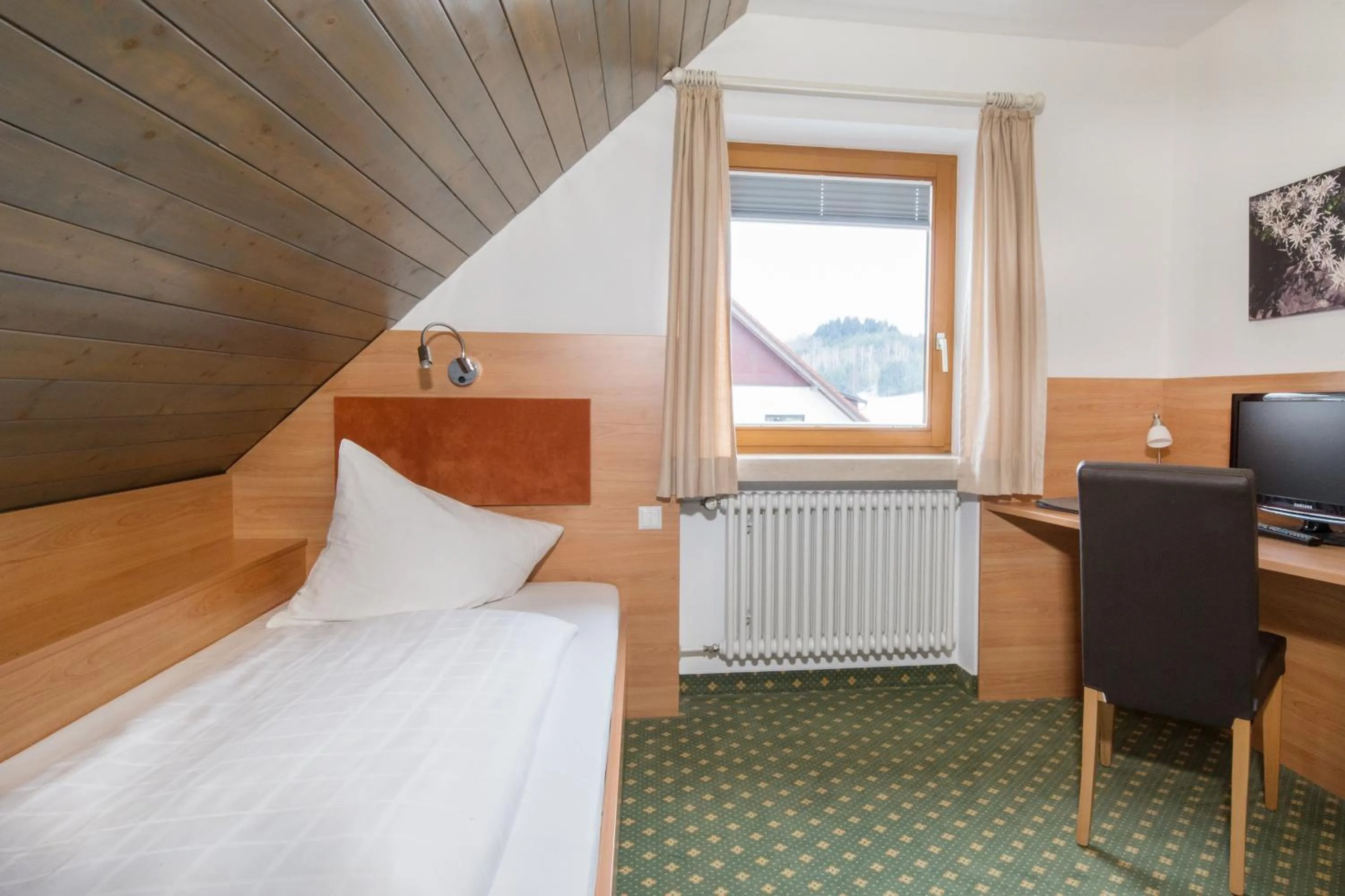 Bed in Hotel Restaurant JÄGERHAUS