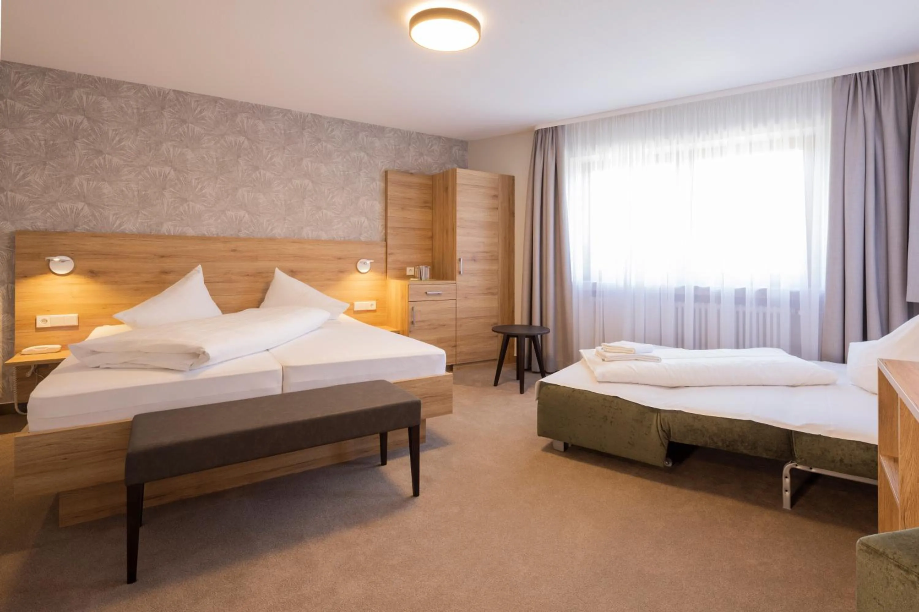 Bed in Hotel Restaurant JÄGERHAUS