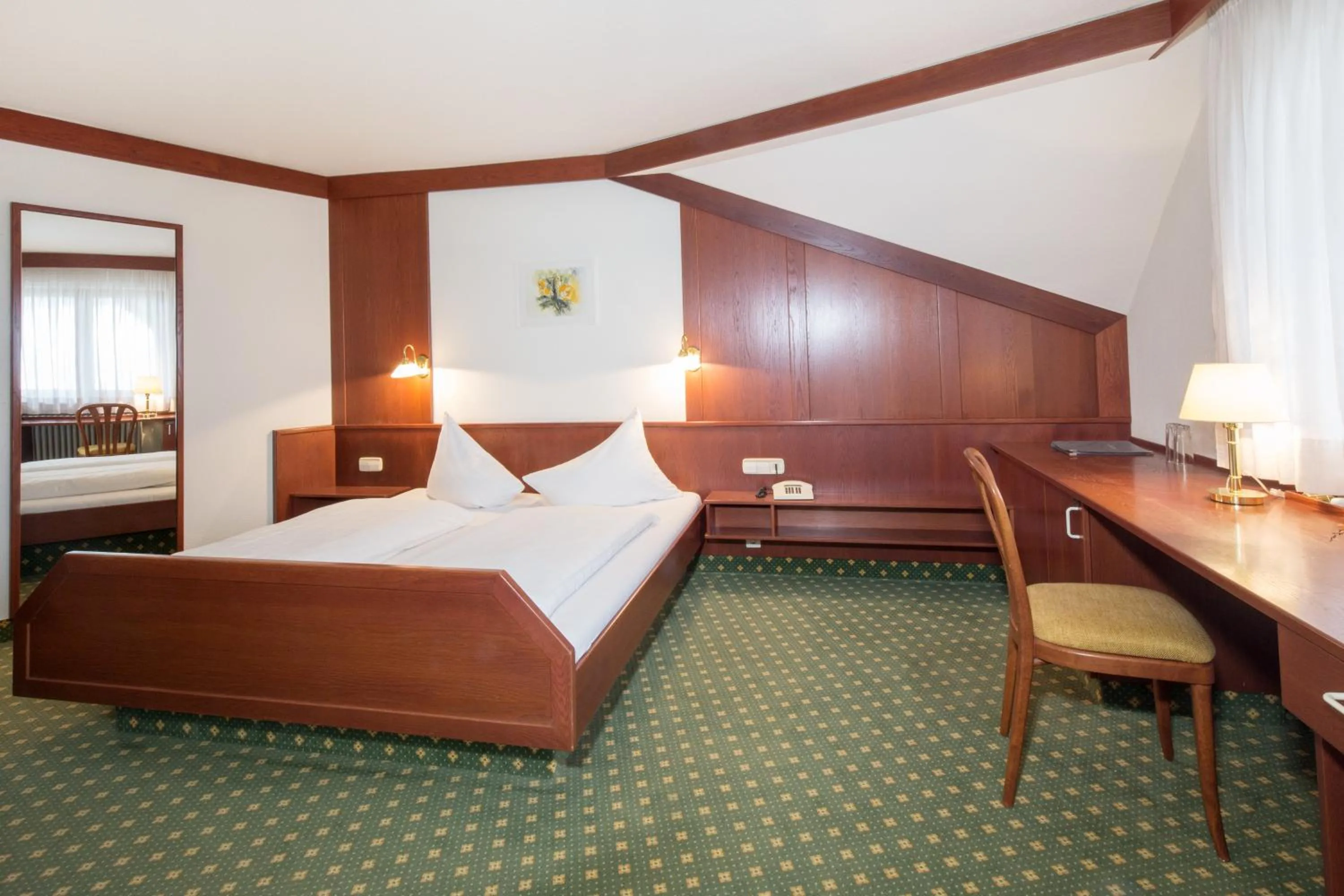 Bed in Hotel Restaurant JÄGERHAUS