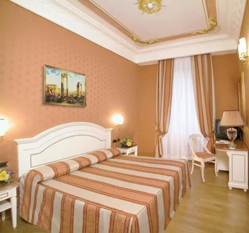 Bed in Hotel La Lumiere Di Piazza Di Spagna