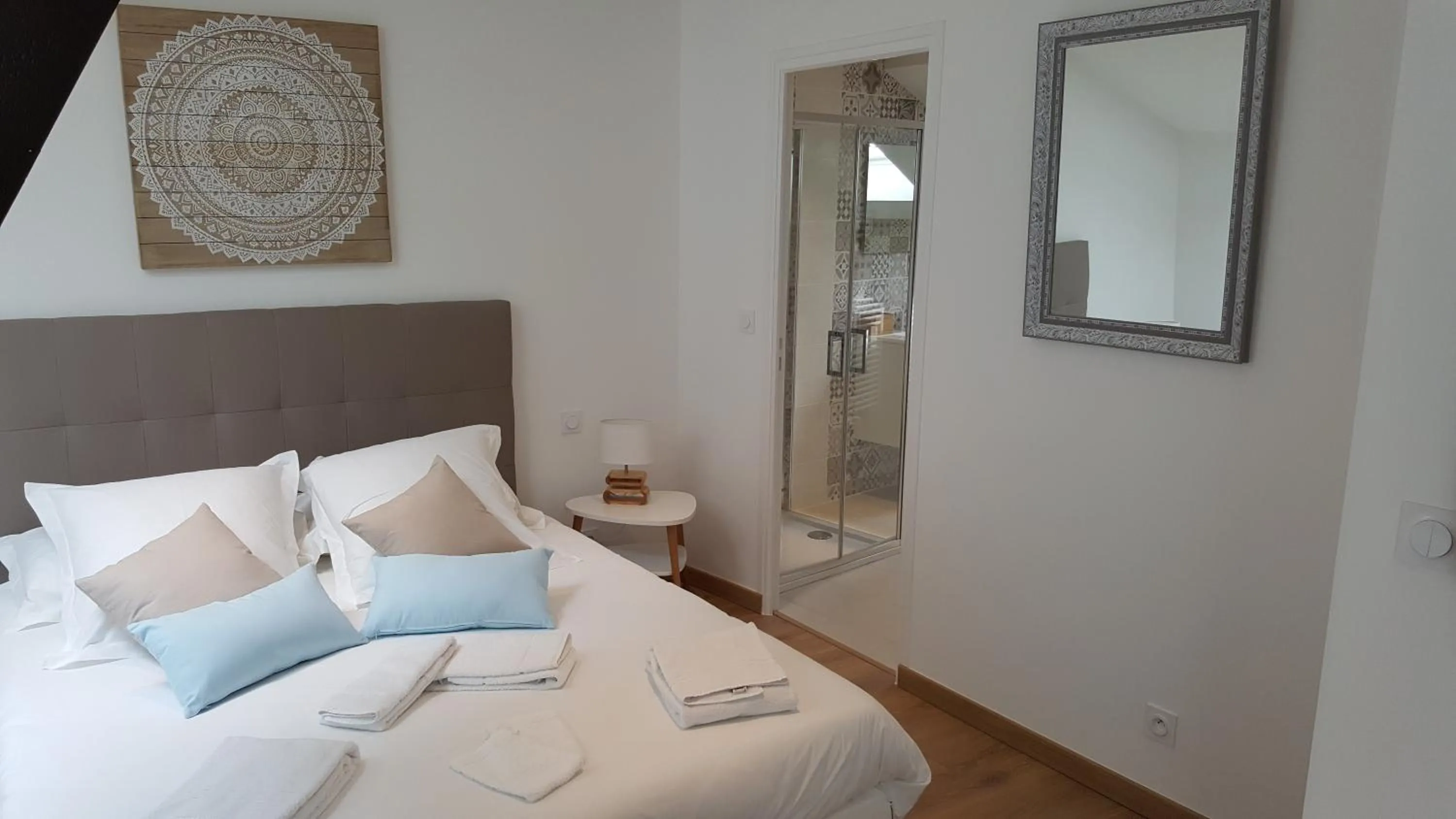 Bed in Le Castel Guesthouse