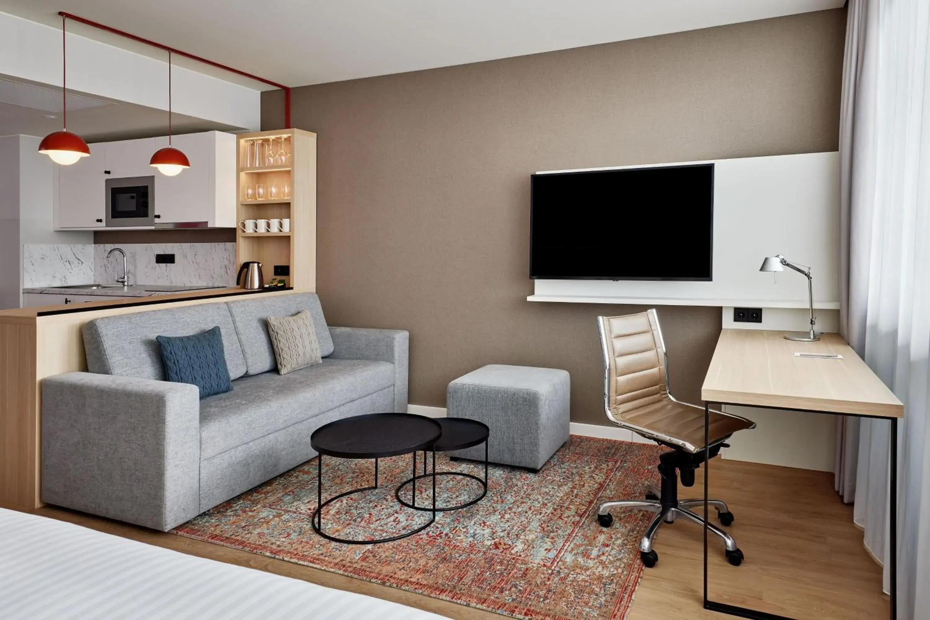 Photo of the whole room, TV/Entertainment Center in Residence Inn by Marriott Munich Central