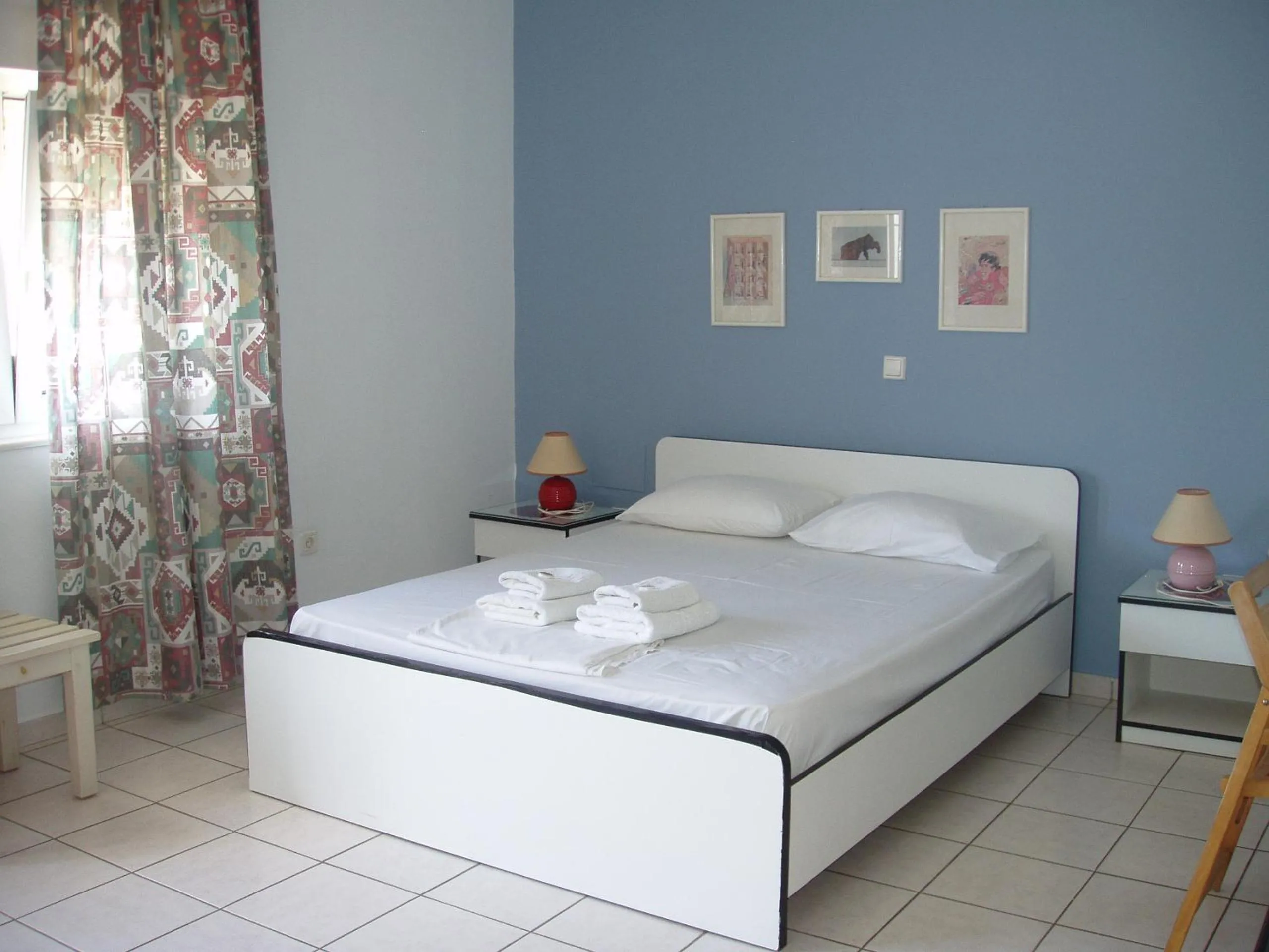 Bed in Aris Apartments