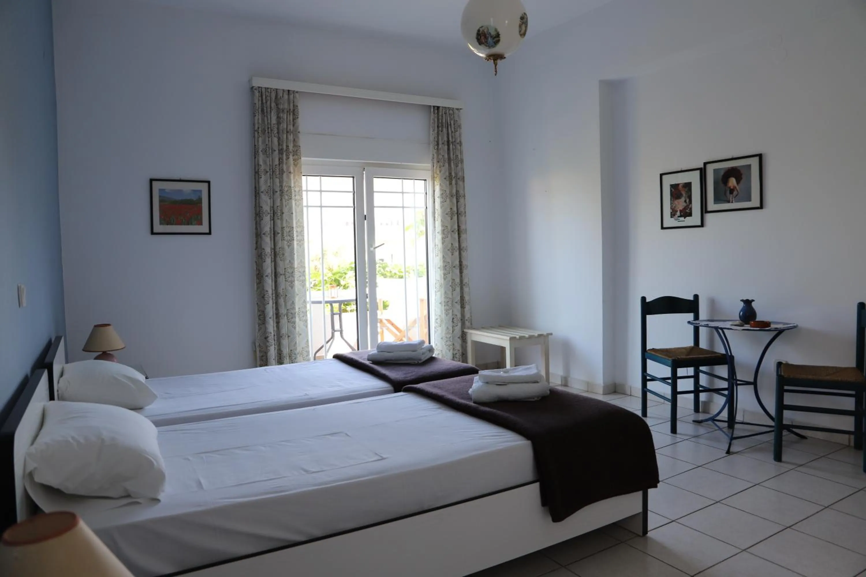 Bed in Aris Apartments