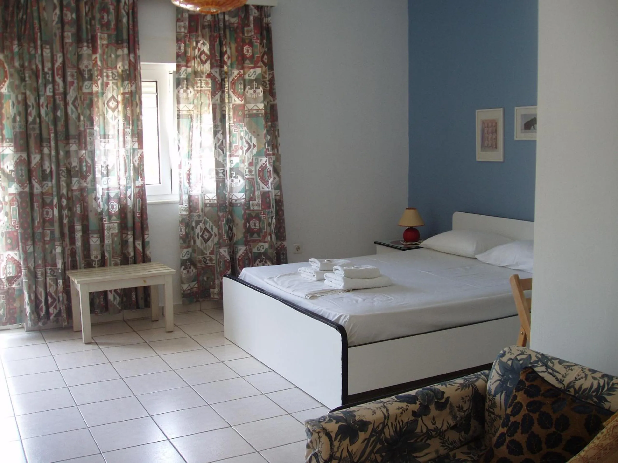 Bed in Aris Apartments