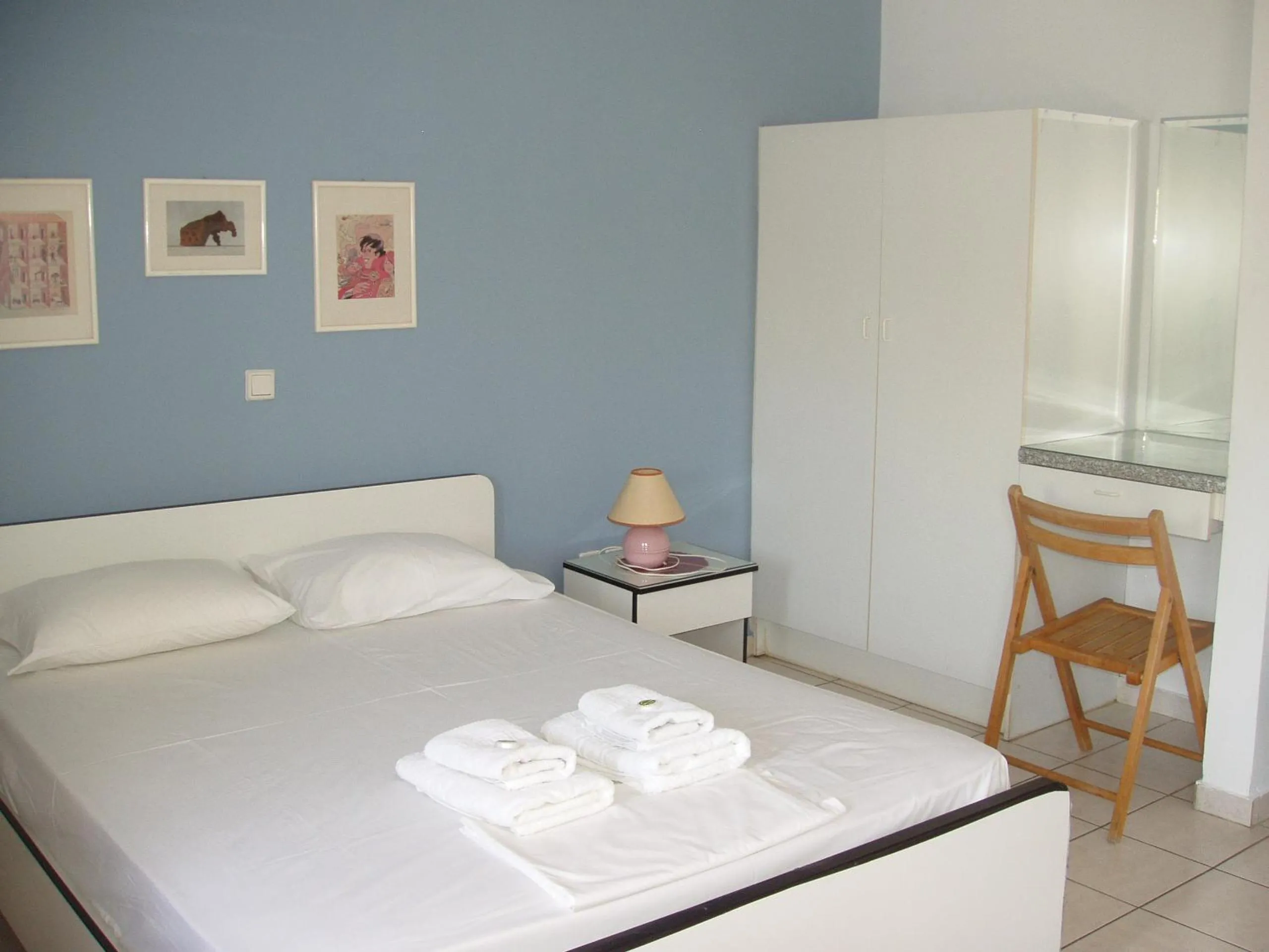 Bed in Aris Apartments
