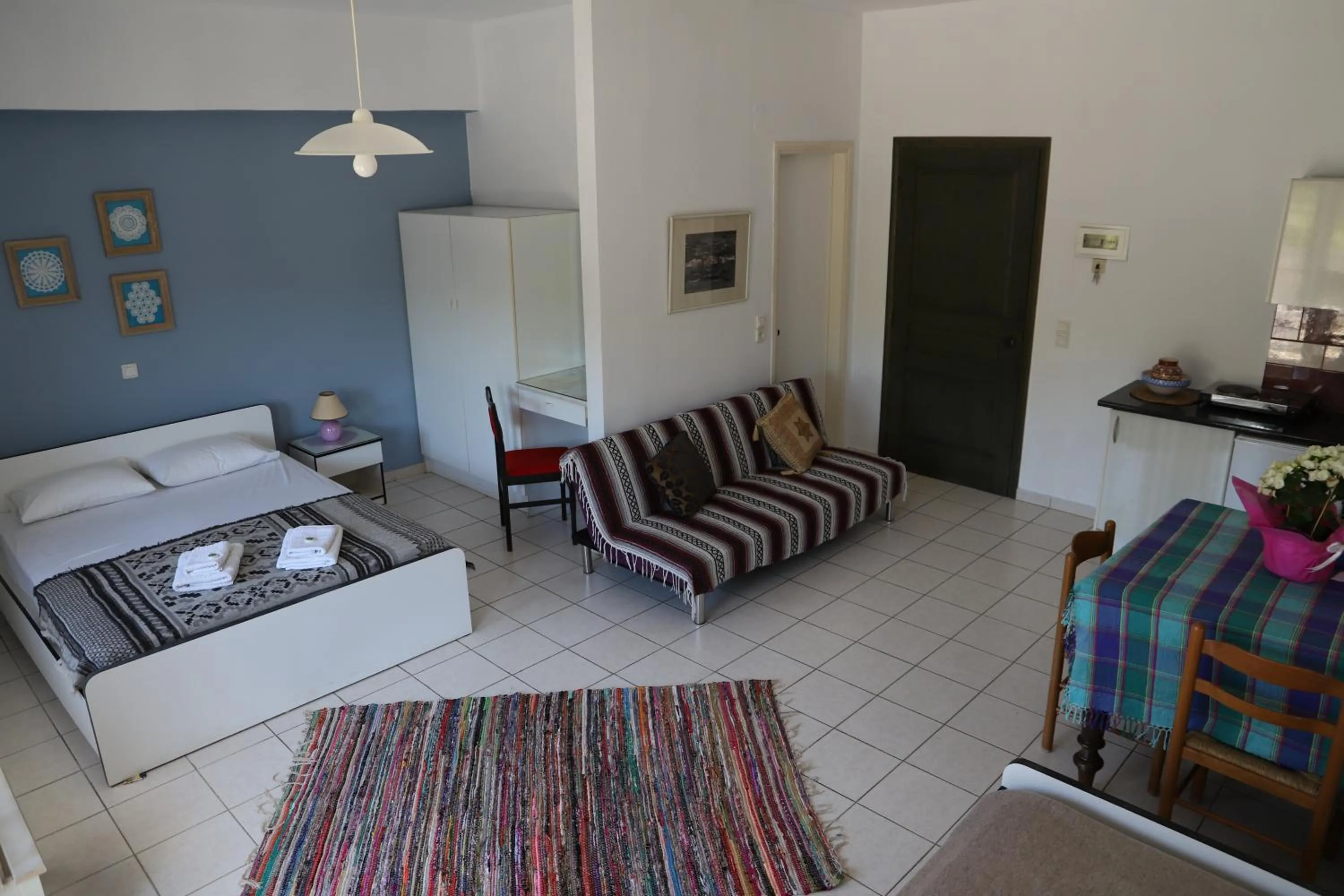 Bed in Aris Apartments