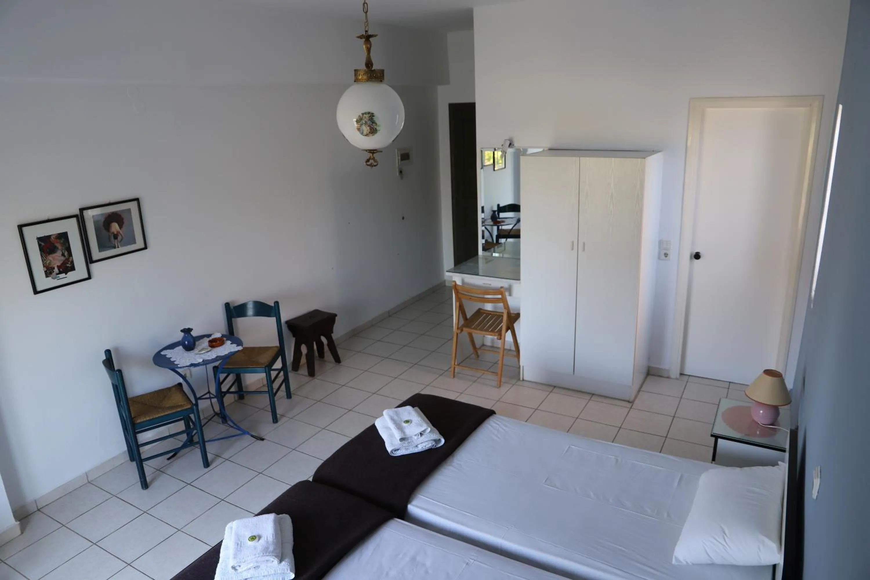Bed in Aris Apartments