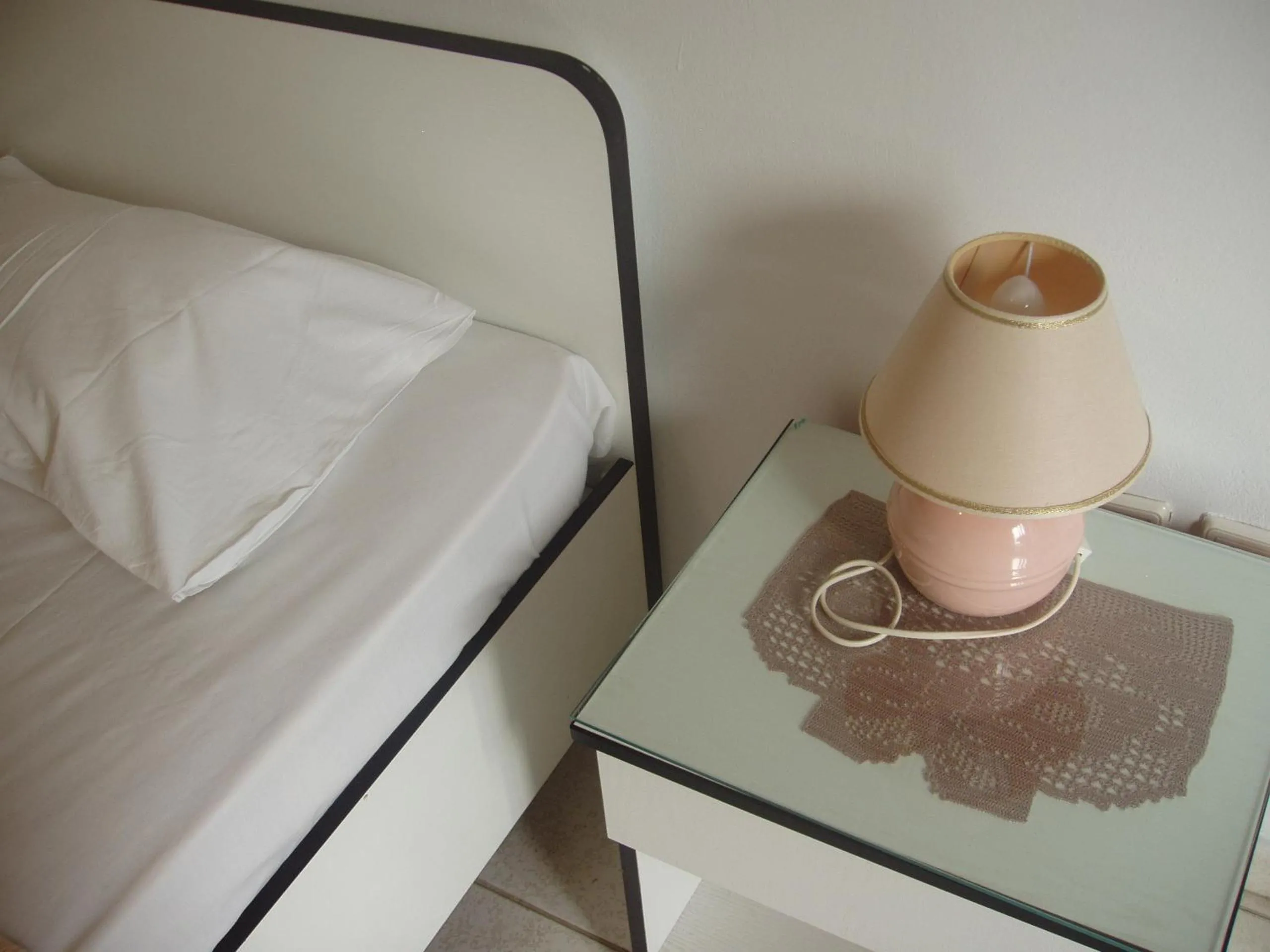 Bed in Aris Apartments