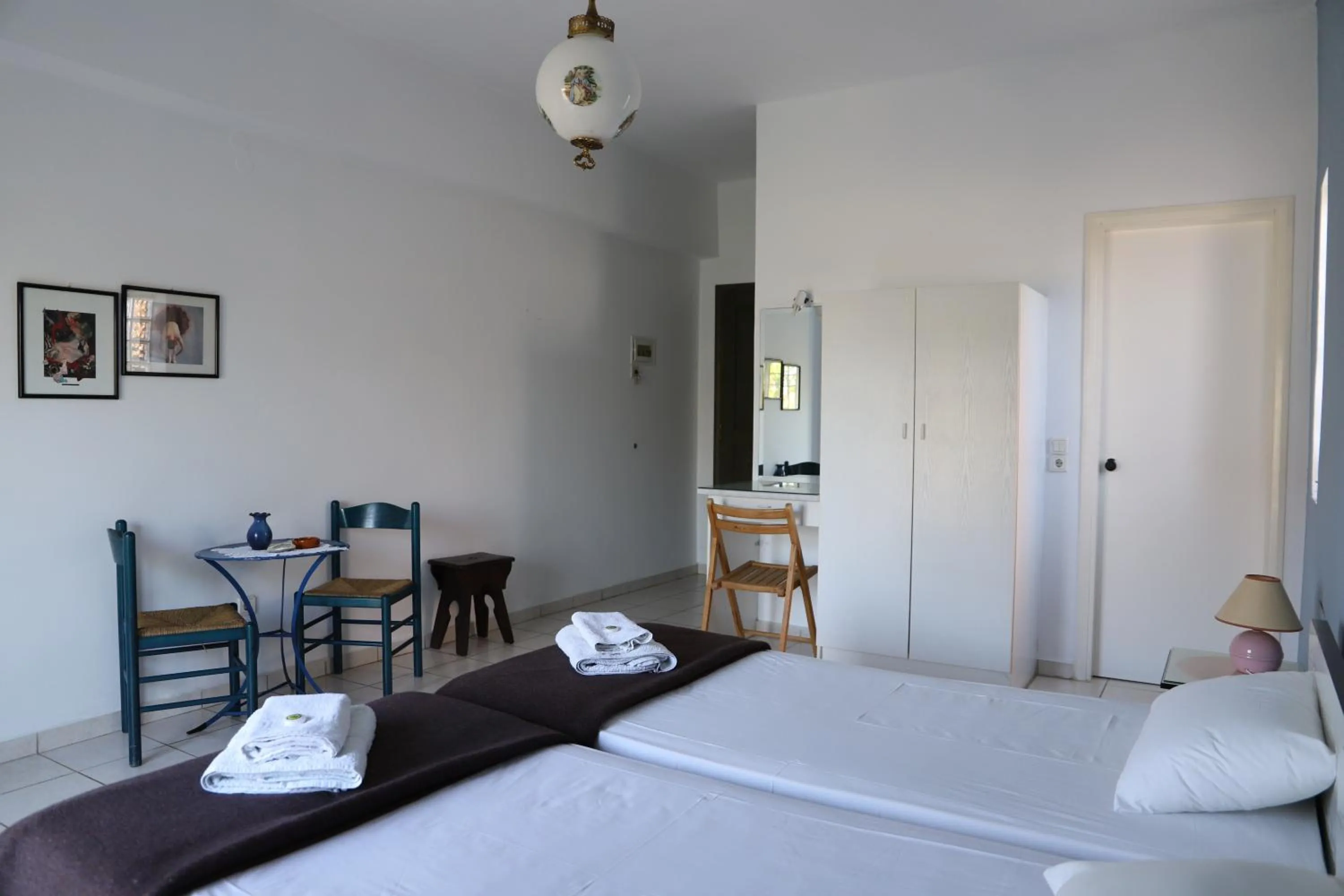 Bed in Aris Apartments