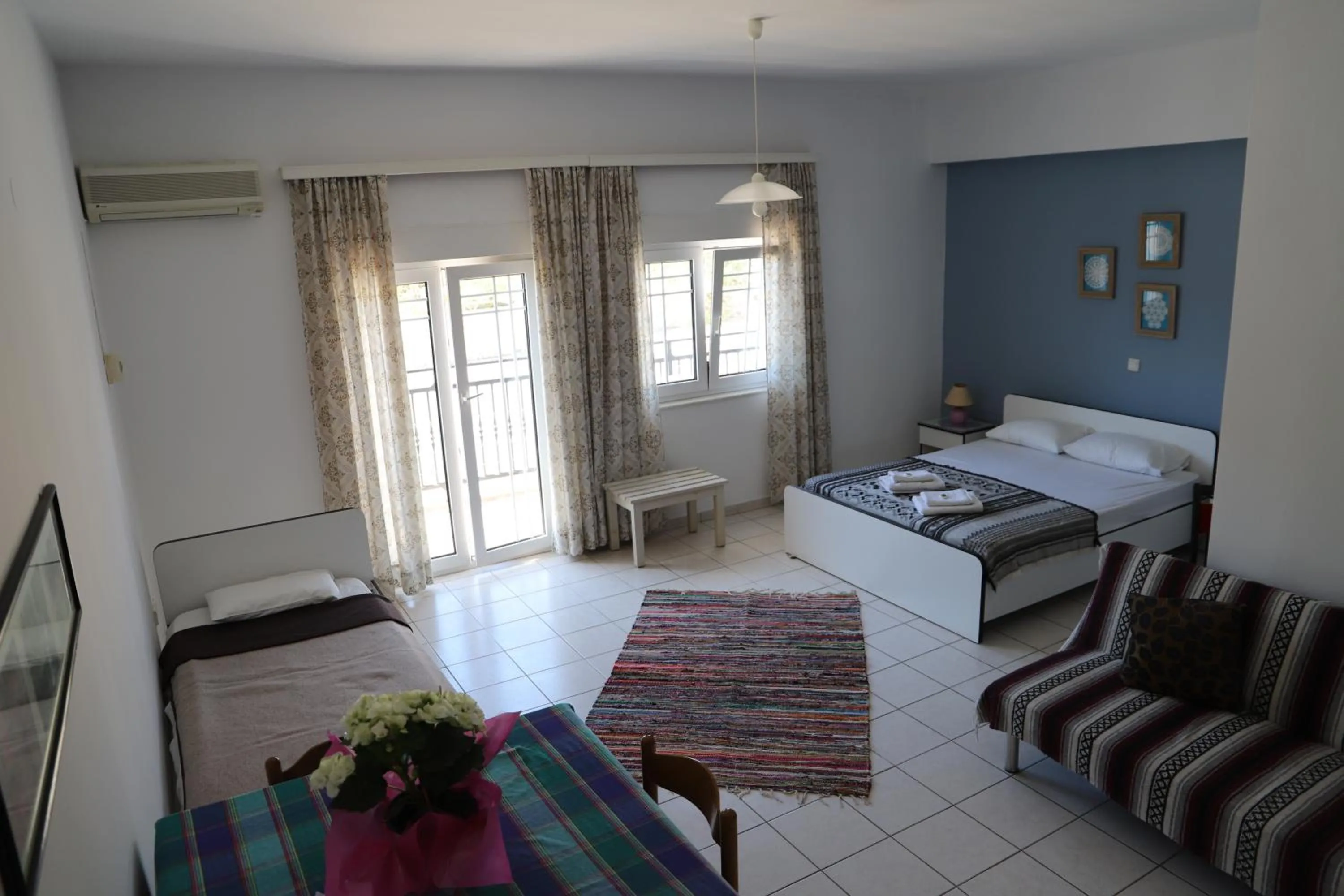 Bed in Aris Apartments