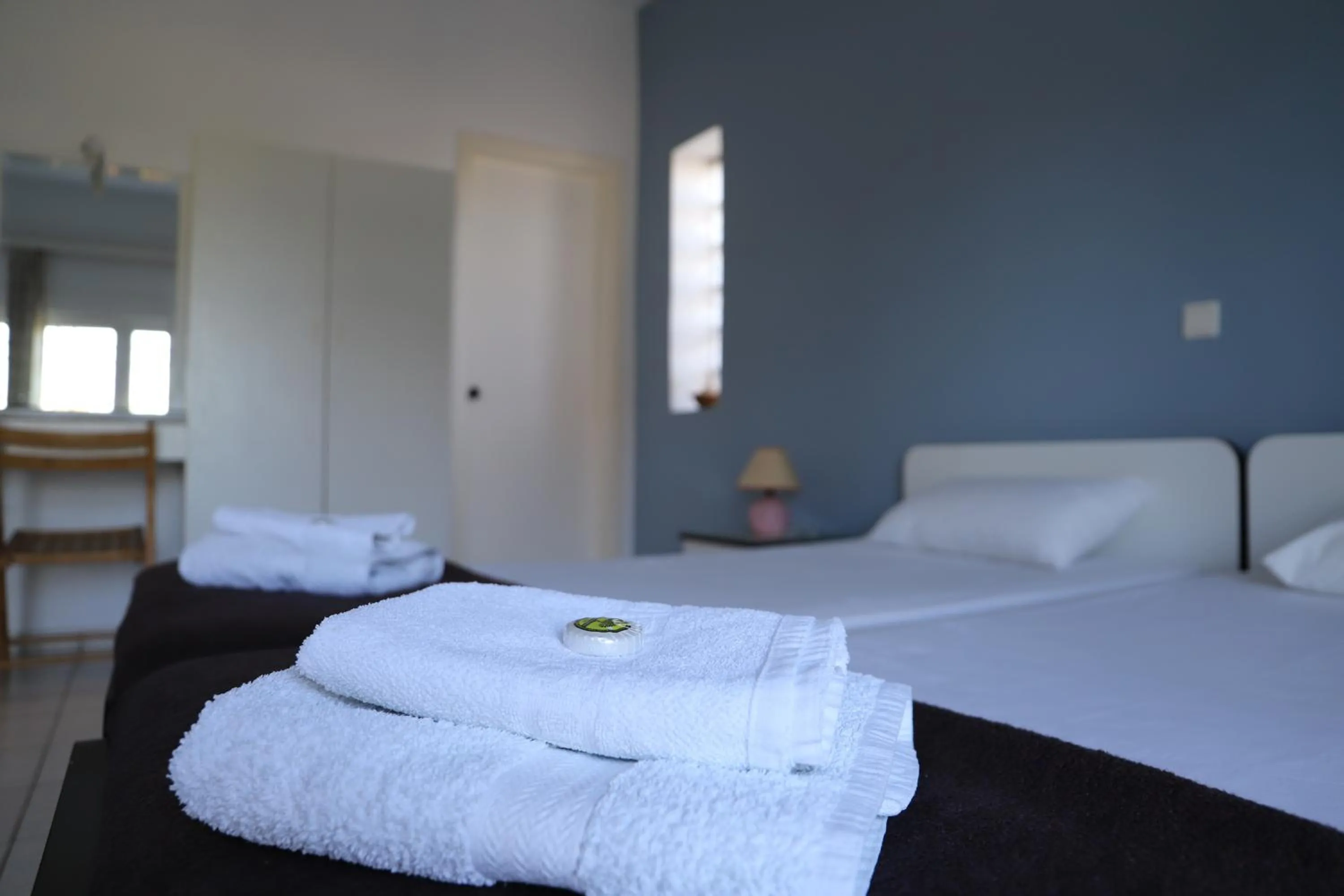 Bed in Aris Apartments