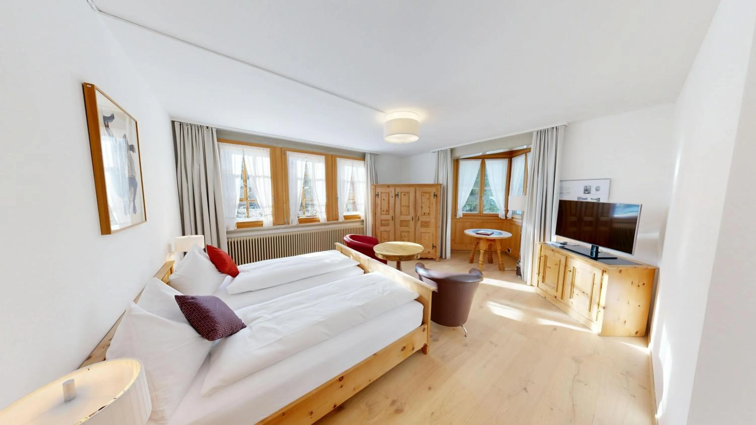 Bed in Schweizerhaus Swiss Quality Hotel