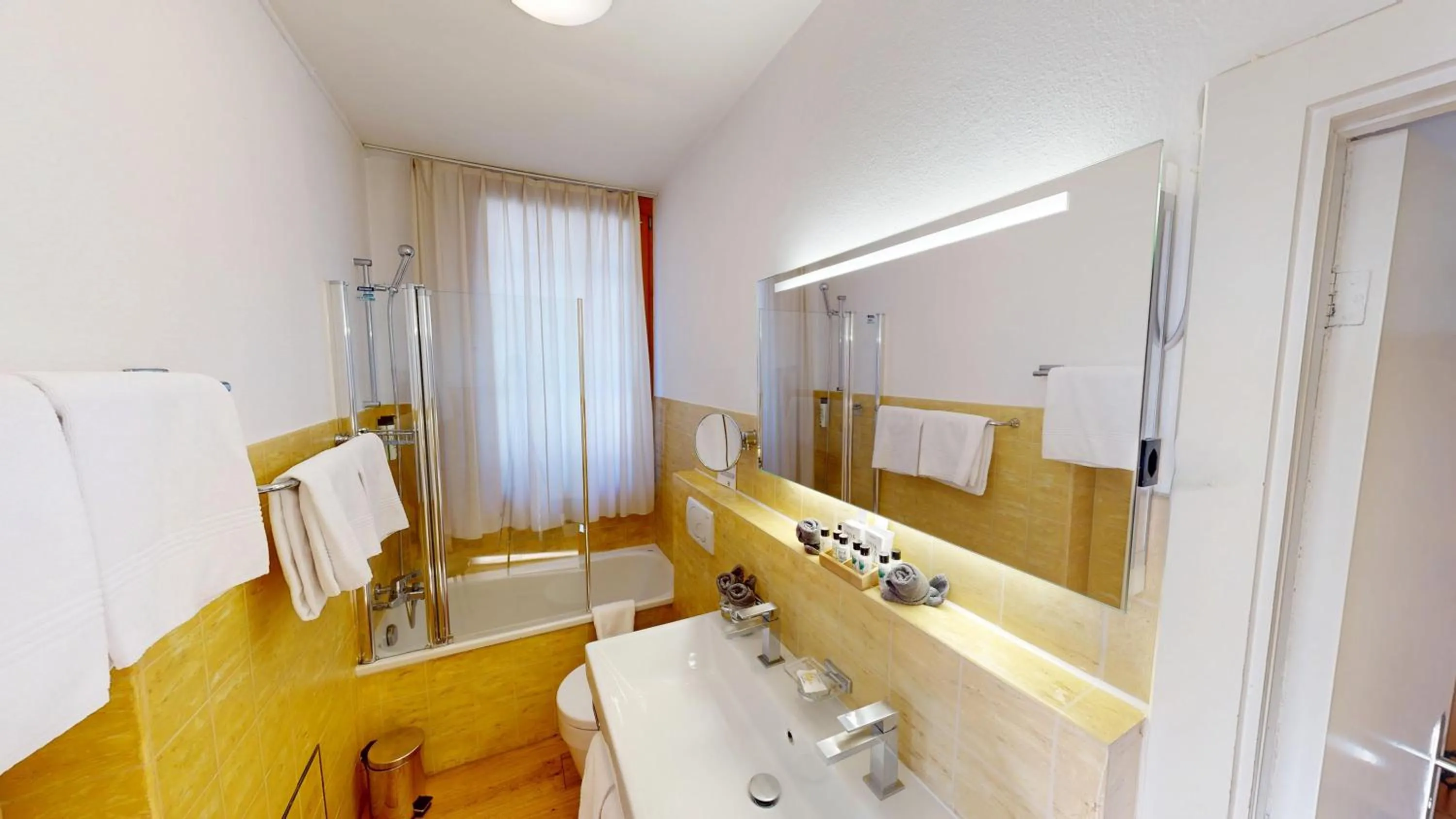 Bathroom in Schweizerhaus Swiss Quality Hotel