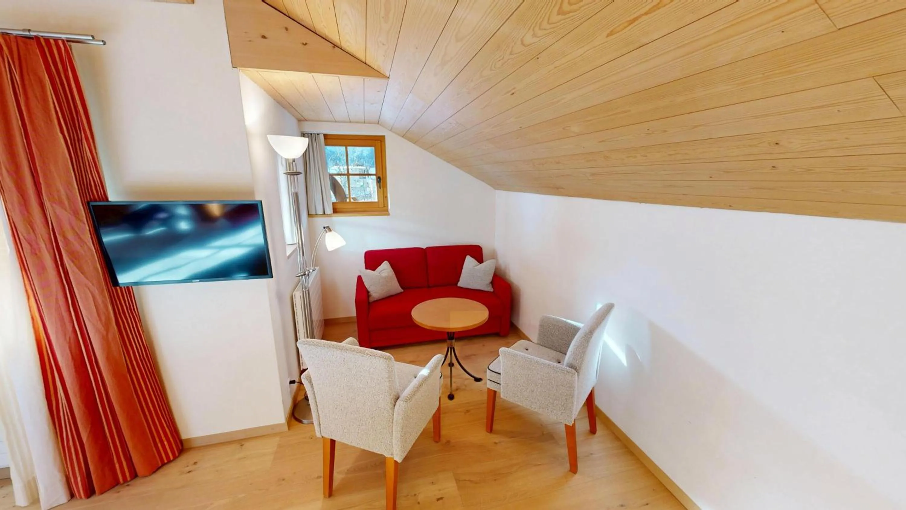 Seating area in Schweizerhaus Swiss Quality Hotel