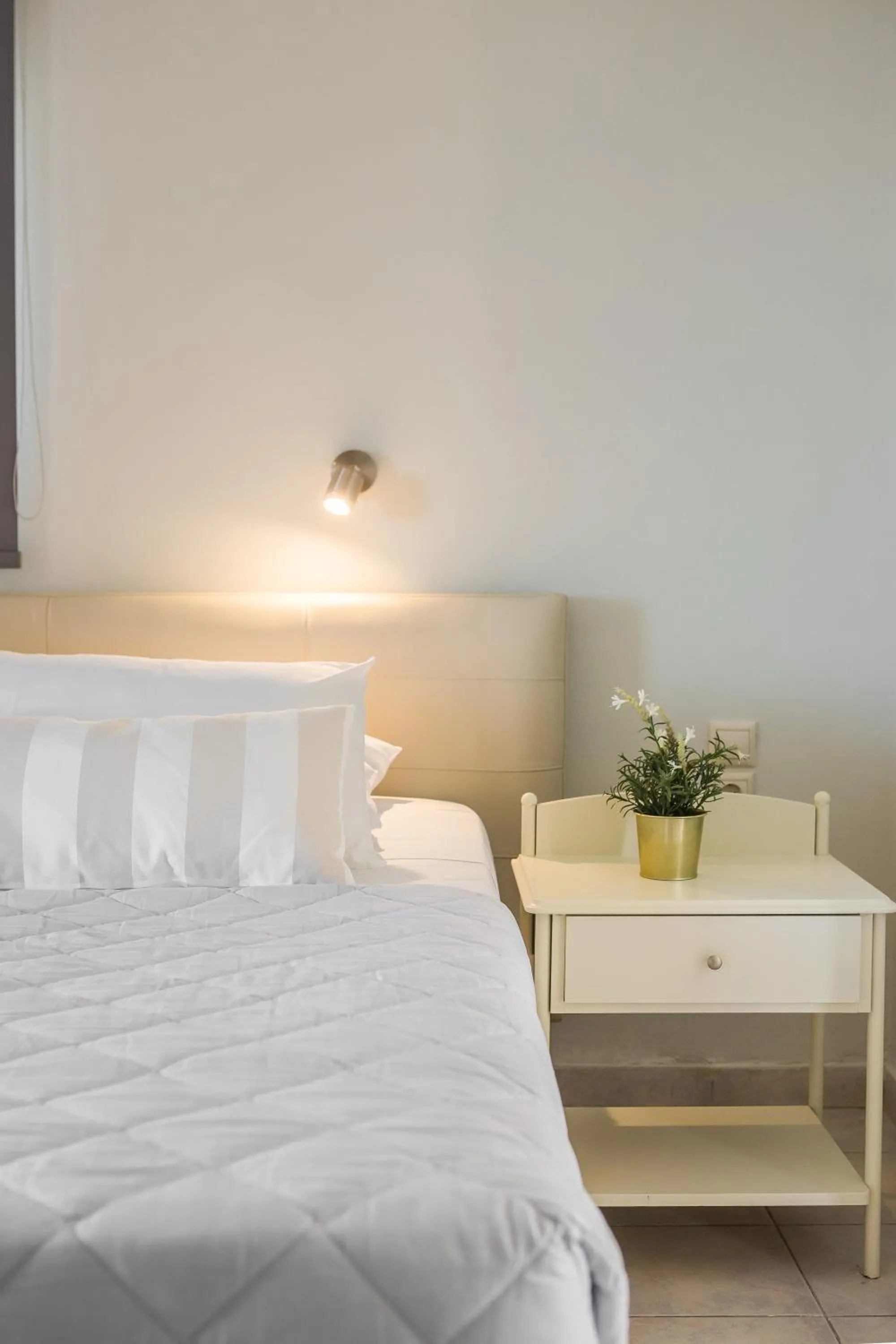 Bed in Panorama Fanari studios and apartments