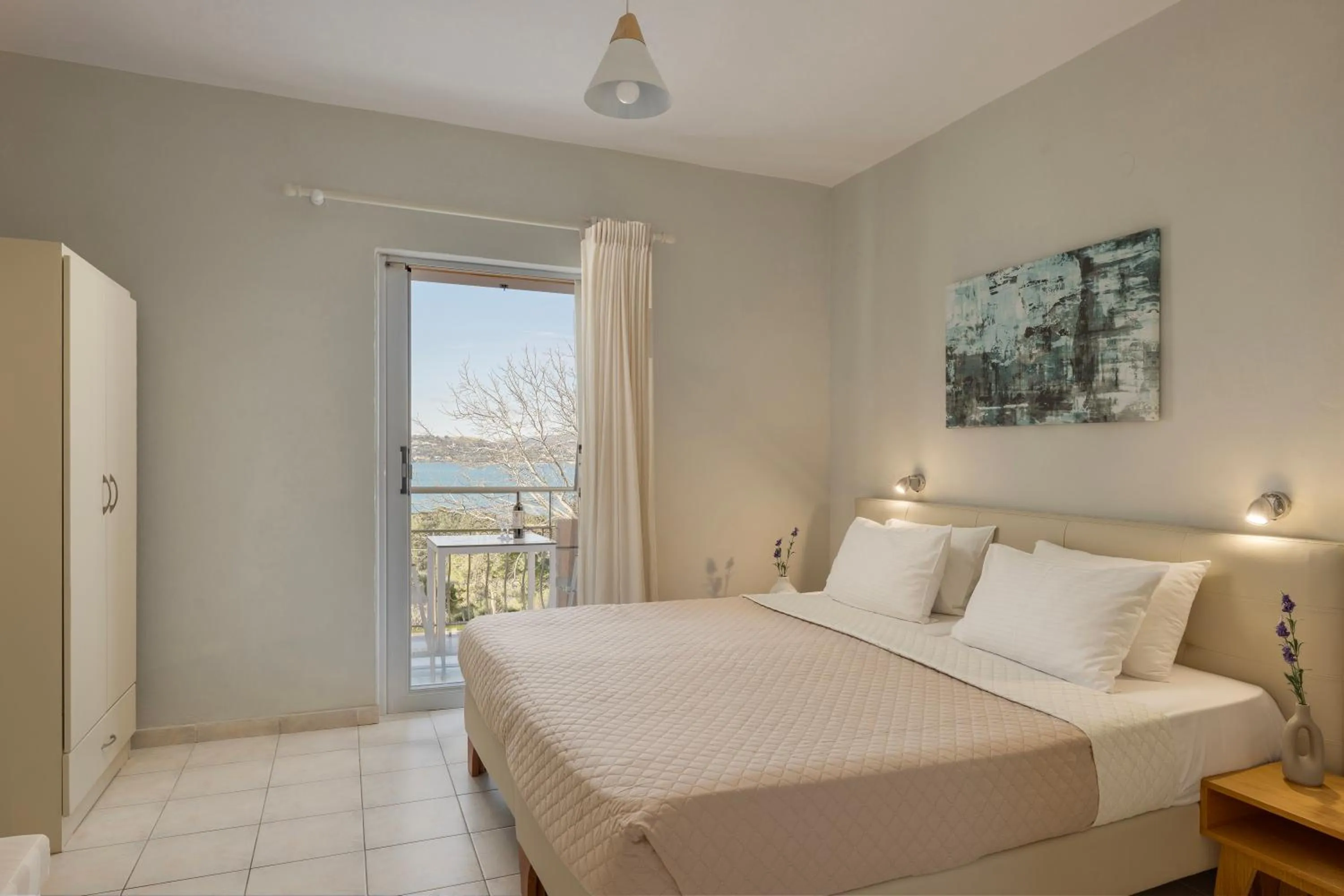 Bed in Panorama Fanari studios and apartments