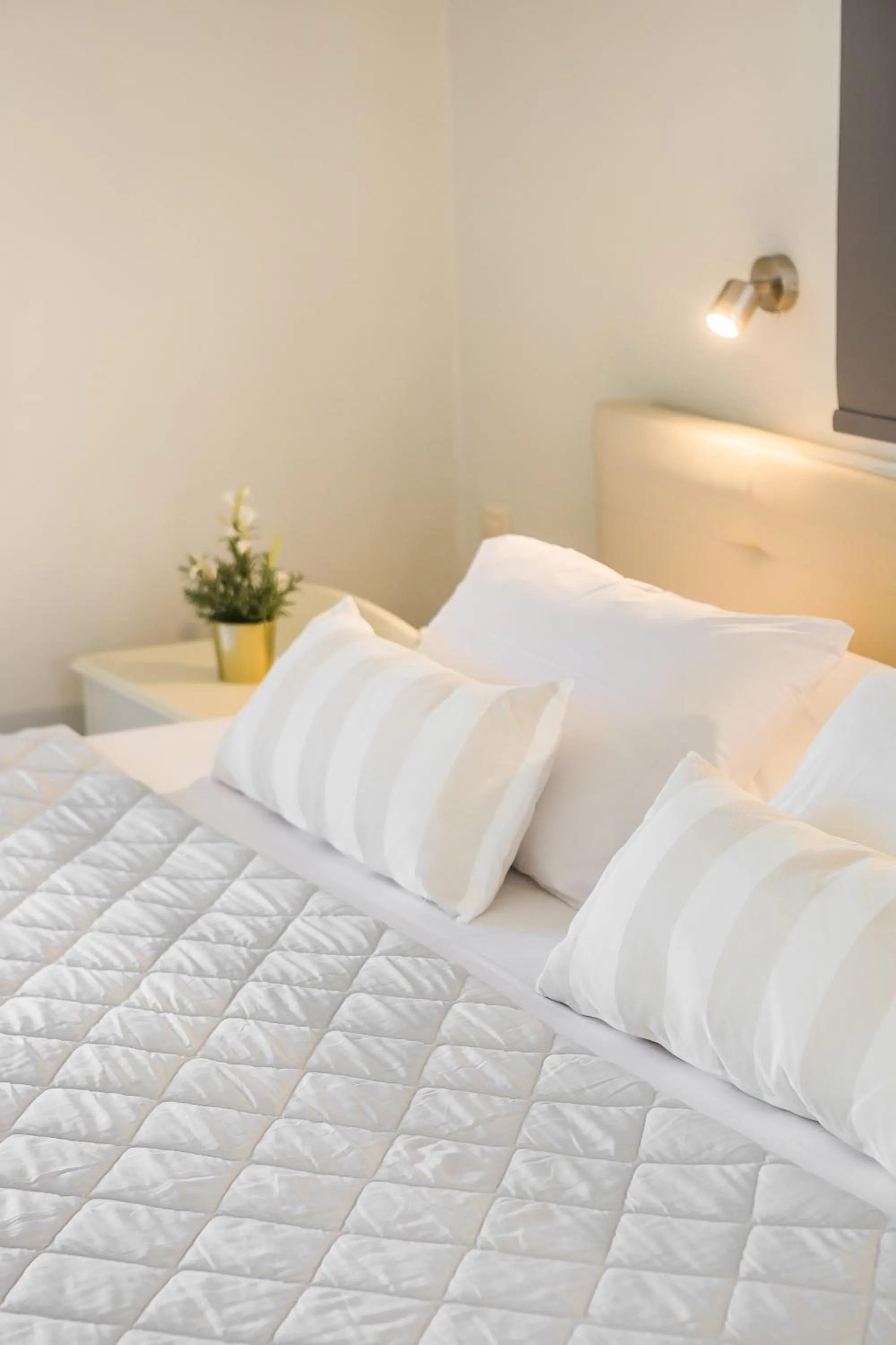 Bed in Panorama Fanari studios and apartments