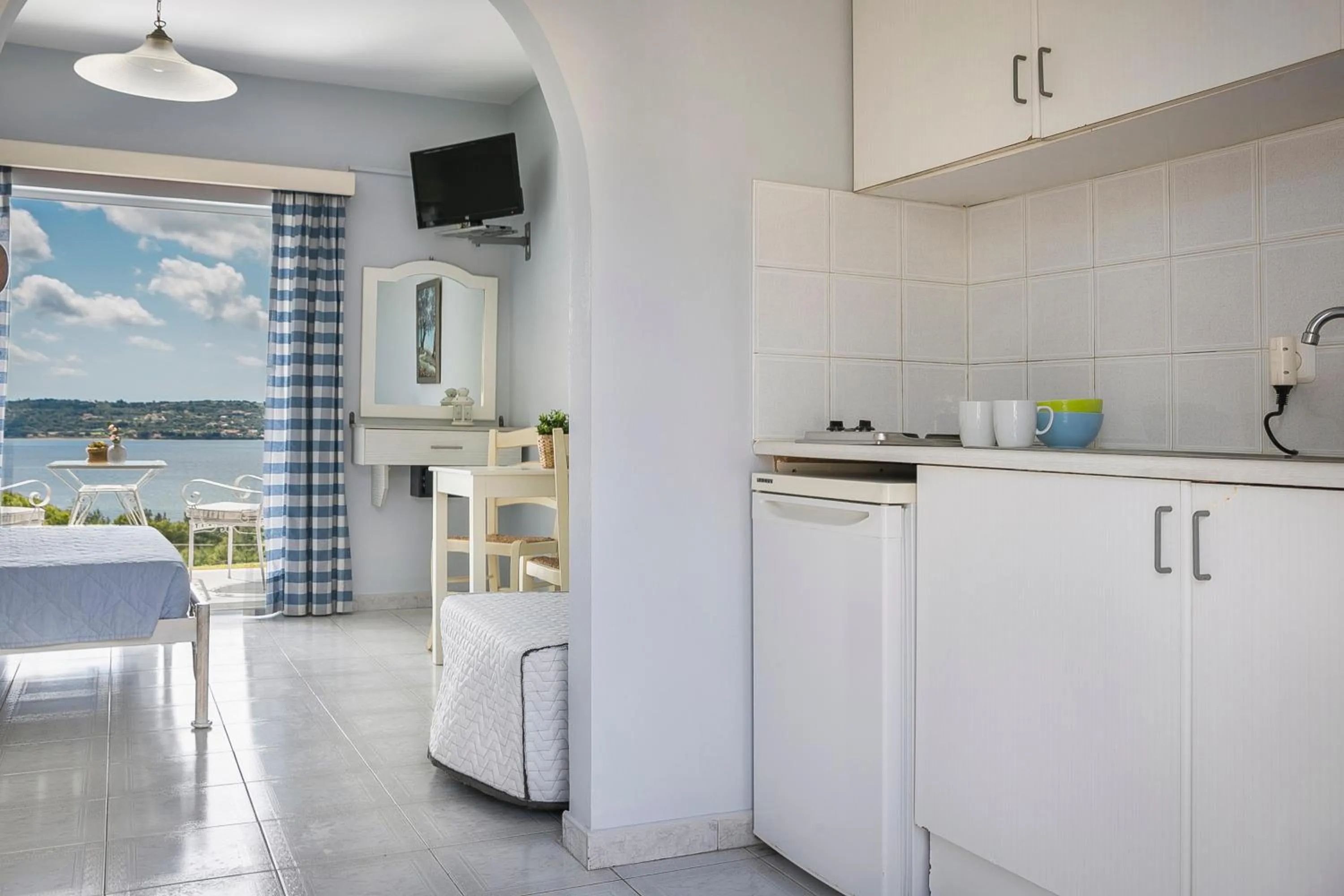 Kitchen or kitchenette, Bed in Panorama Fanari studios and apartments