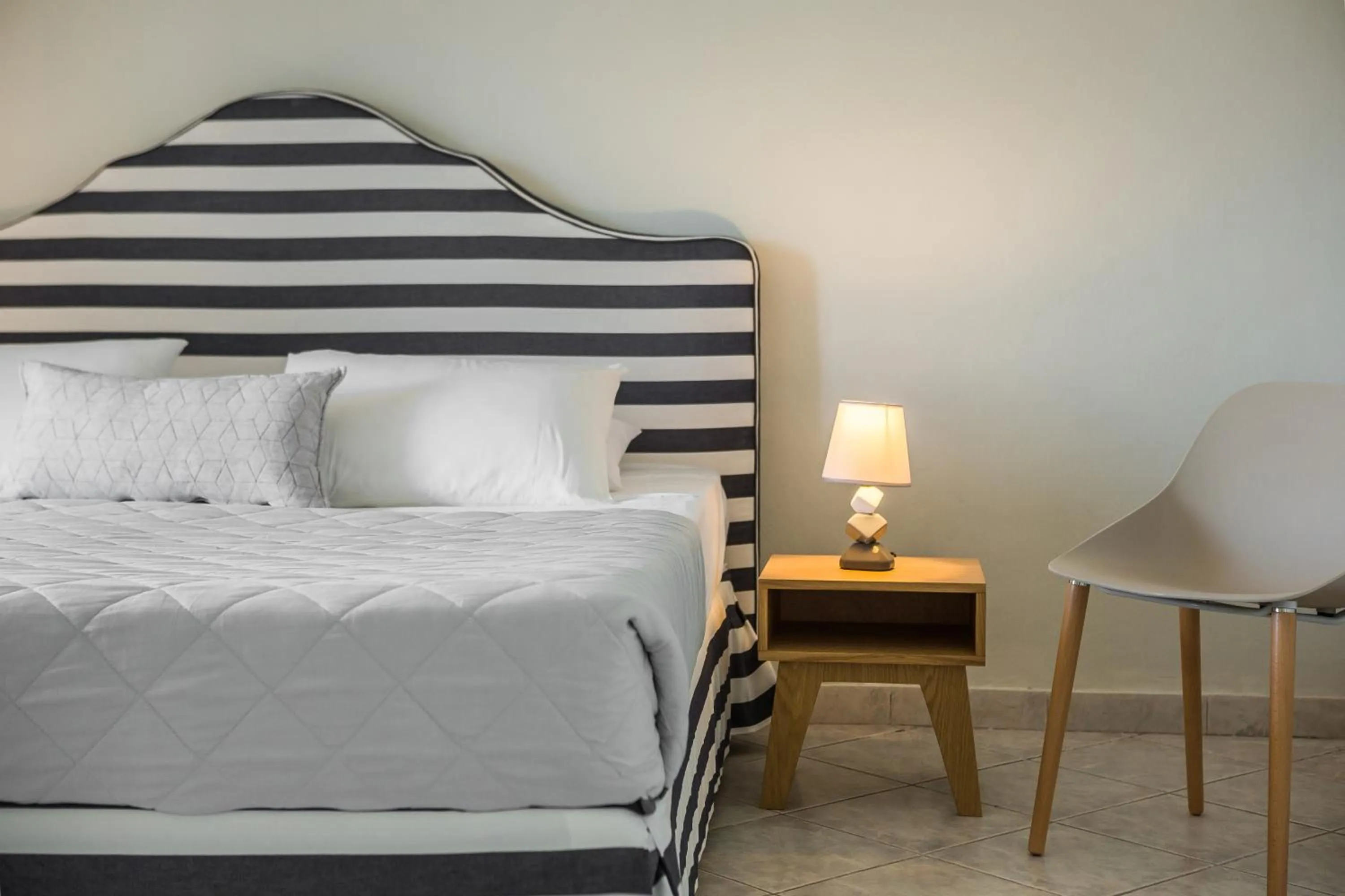 Bed in Panorama Fanari studios and apartments