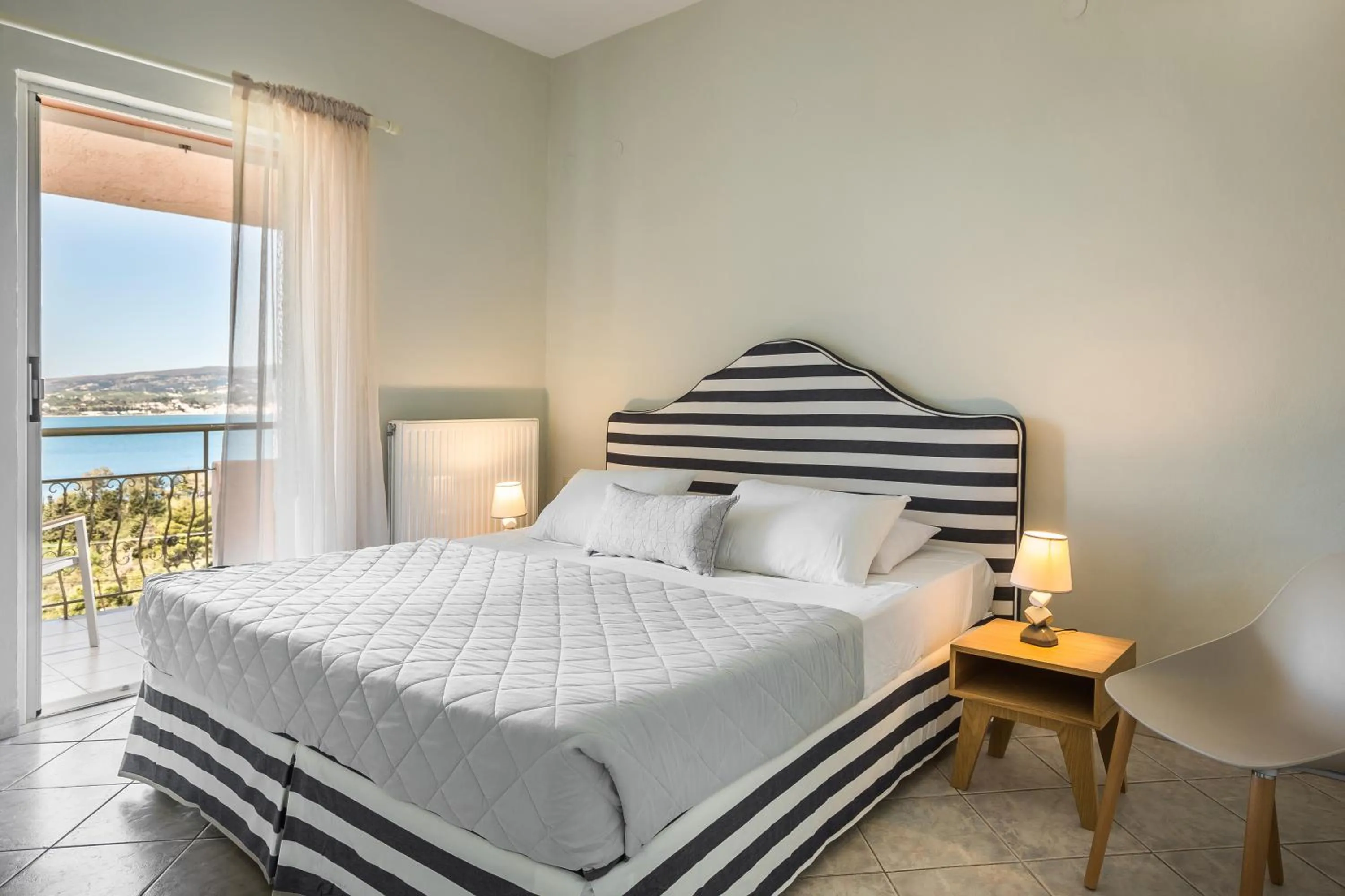 Bed in Panorama Fanari studios and apartments