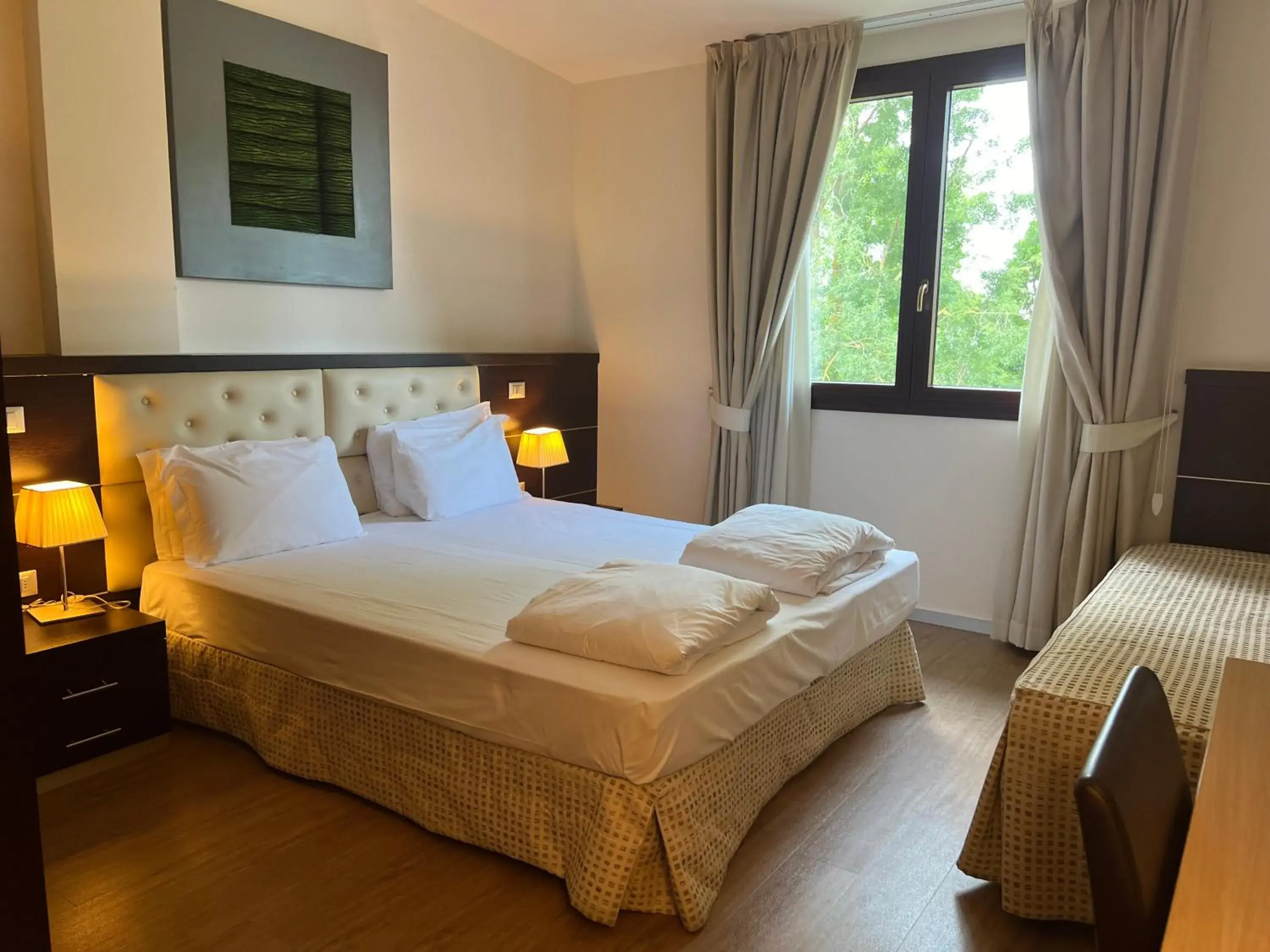 Bed in GREEN GARDEN Resort - Smart Hotel Bed in GREEN GARDEN Resort - Smart Hotel