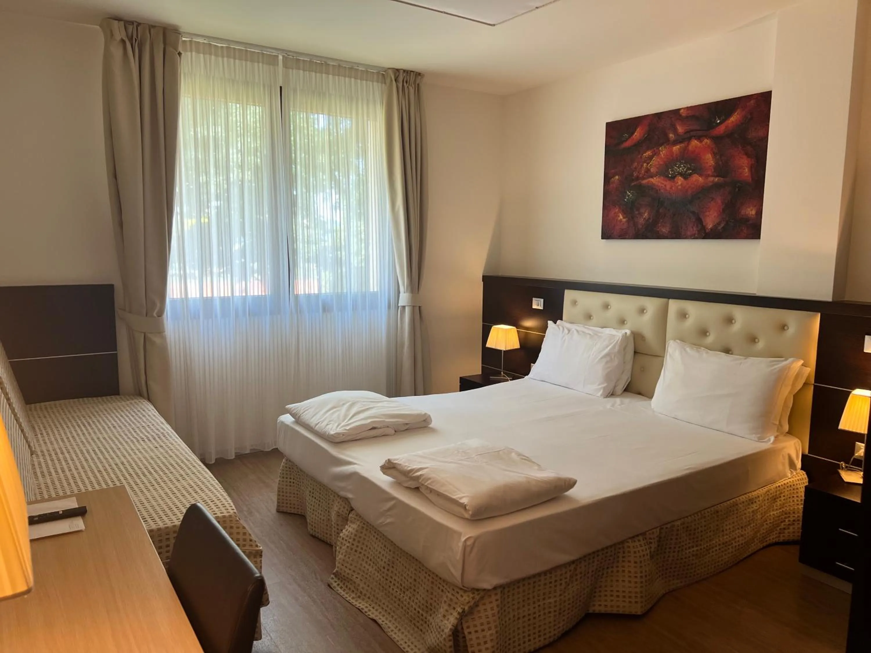 Bed in GREEN GARDEN Resort - Smart Hotel