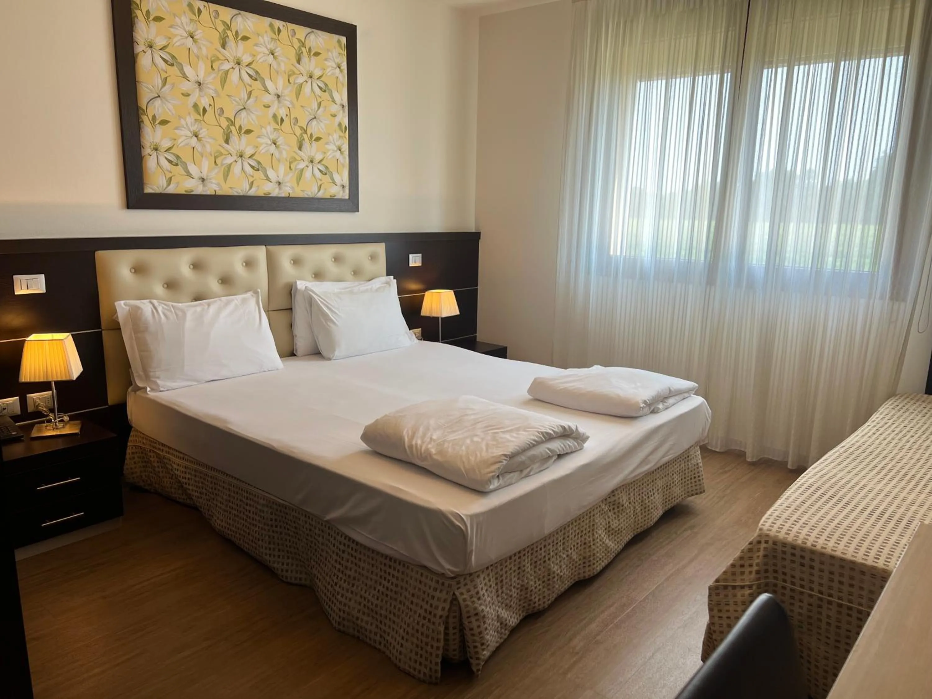 Bed in GREEN GARDEN Resort - Smart Hotel