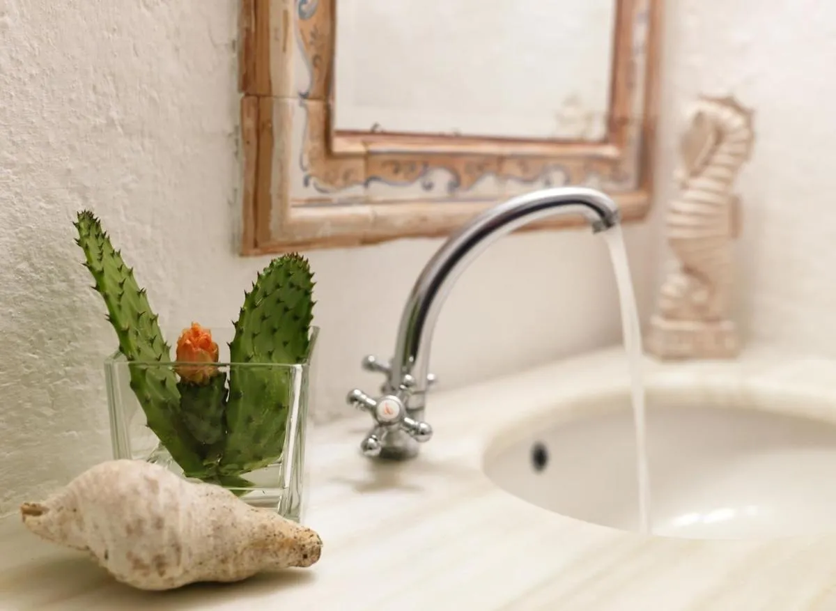 Bathroom in AFOURA HOUSES by K&K