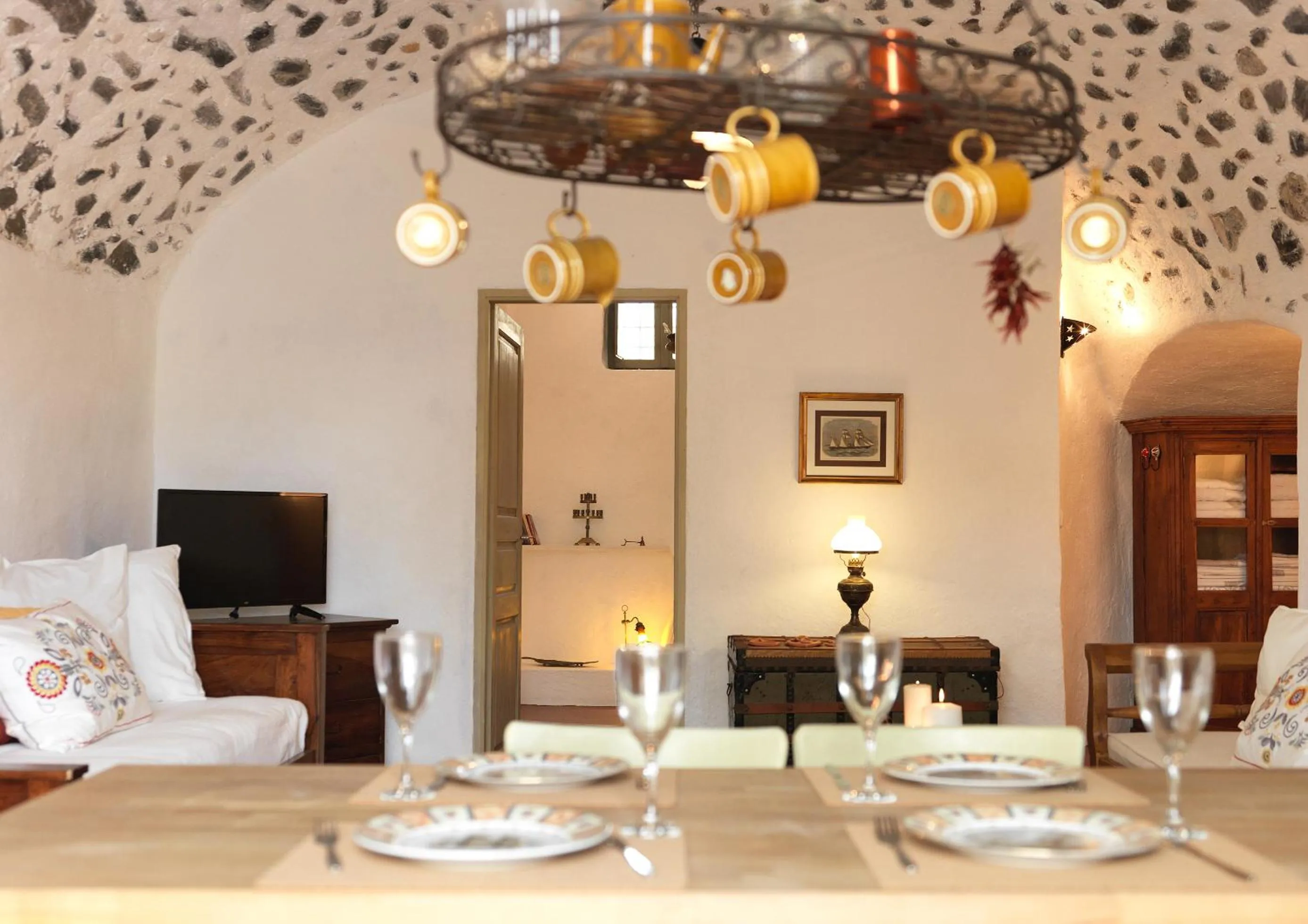 Dining area in AFOURA HOUSES by K&K