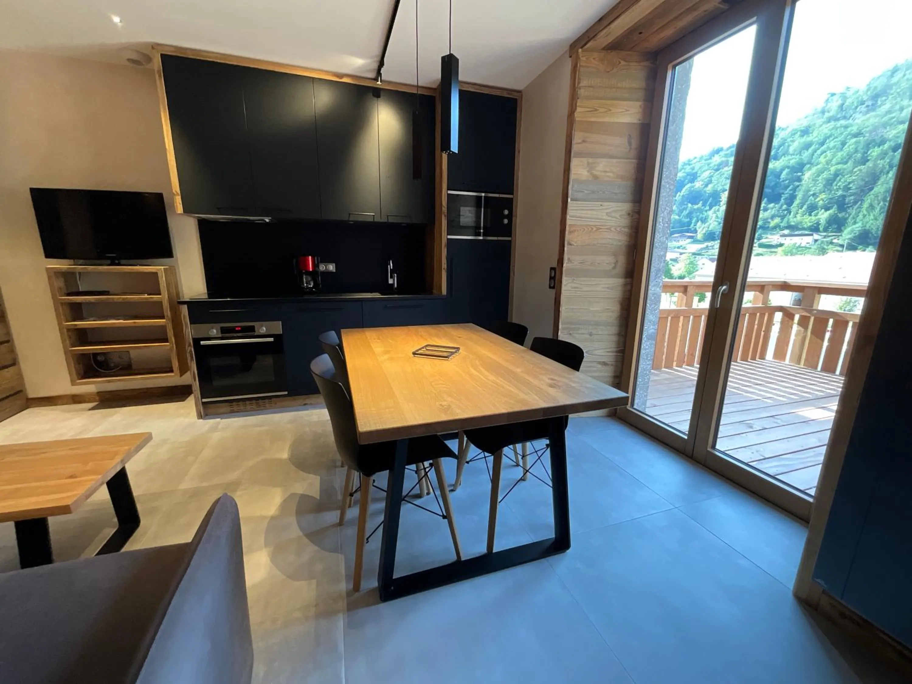 Living room in Gite Roche Des Ducs avec Piscine toute l'année, Spa, Sauna, Hammam