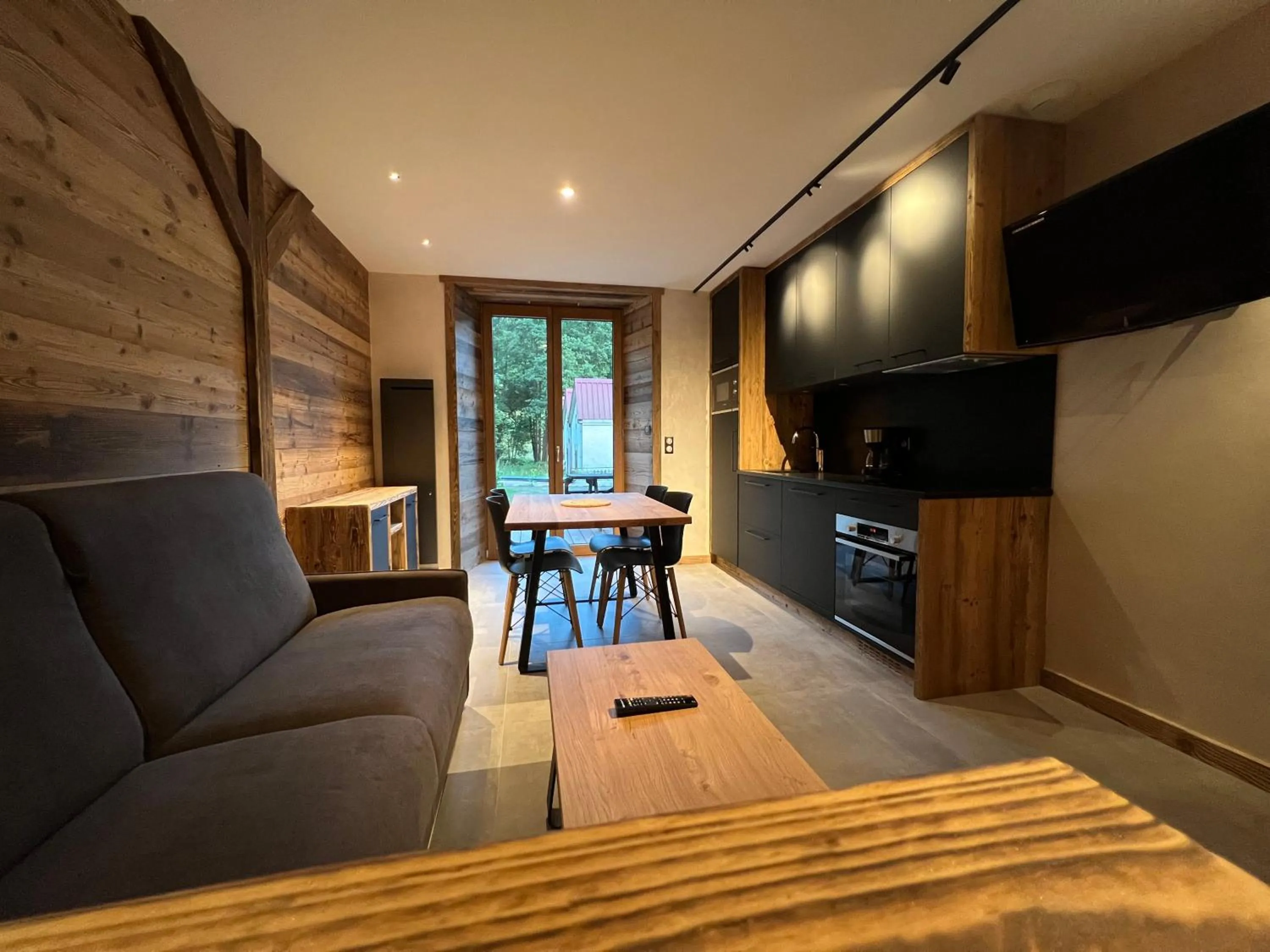 Kitchen or kitchenette in Gite Roche Des Ducs avec Piscine toute l'année, Spa, Sauna, Hammam